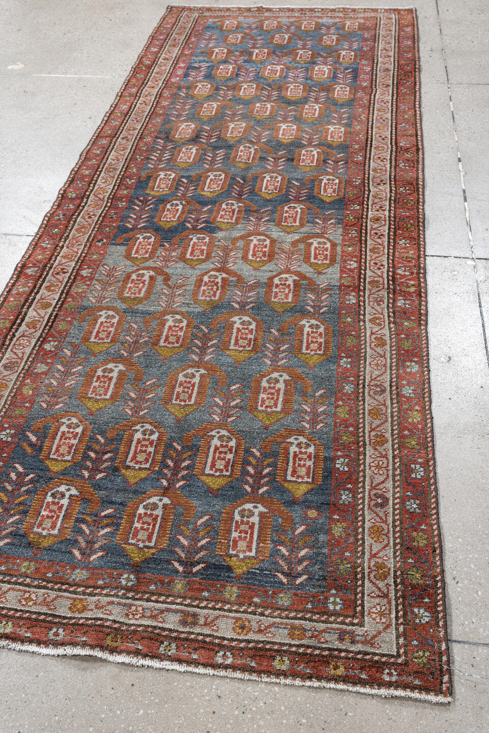 3' x 8' one-of-a-kind handmade antique Malayer runner rug. Color palette: blue, rust, ivory, rose, olive, terra cotta, brown