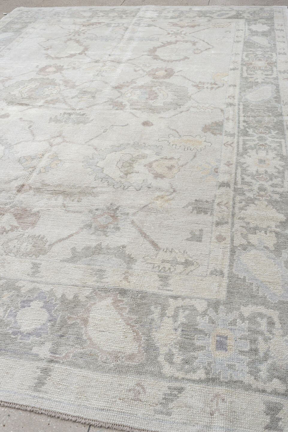 9' x 13' one-of-a-kind handmade vintage Oushak large size rug. Color palette: ivory, pale gray, blush, taupe, sage