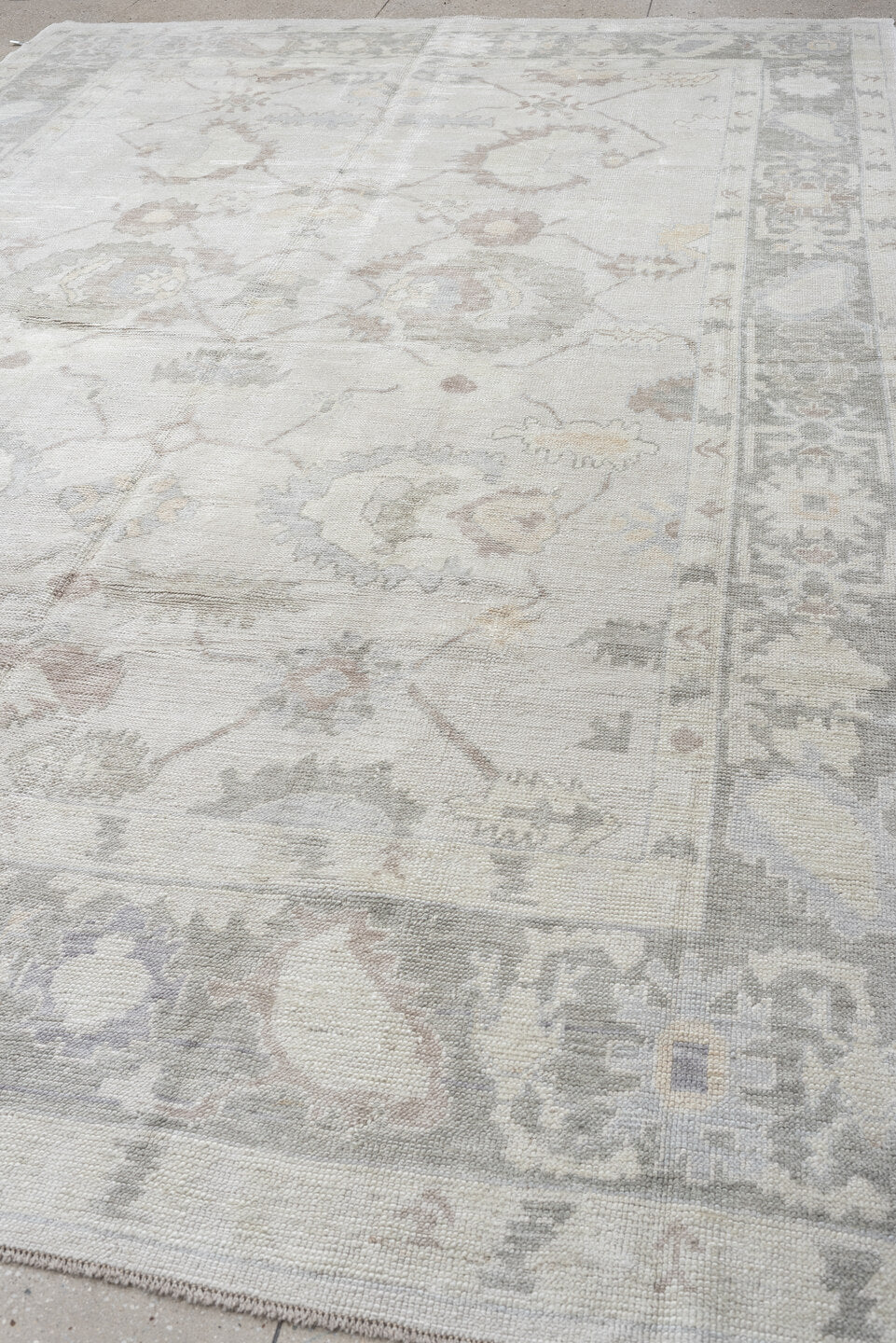 9' x 13' one-of-a-kind handmade vintage Oushak large size rug. Color palette: ivory, pale gray, blush, taupe, sage