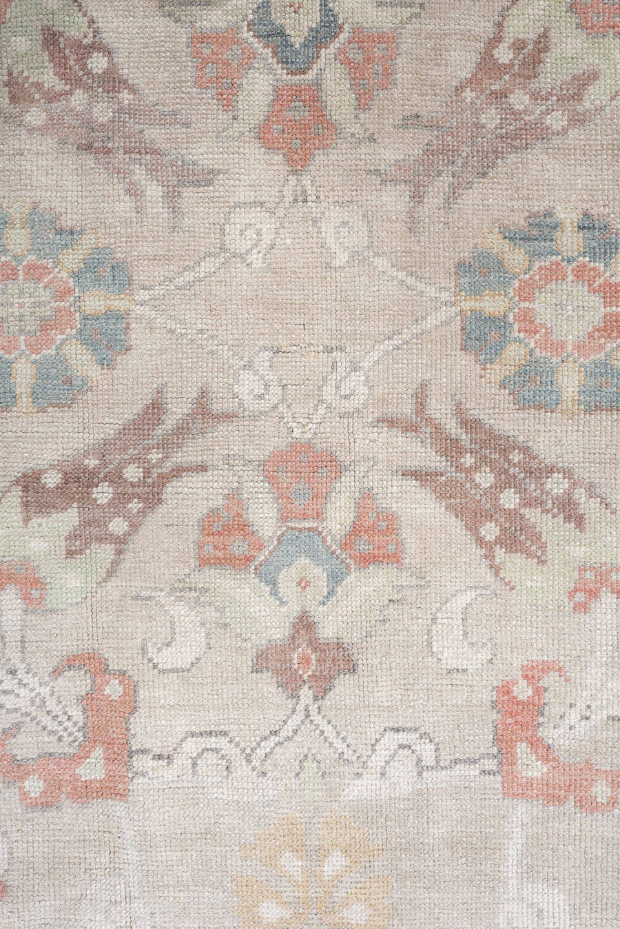 4' x 8' one-of-a-kind handmade antique Oushak rug. Color palette: taupe, ivory, pale blue, coral, soft gold, rose, sage