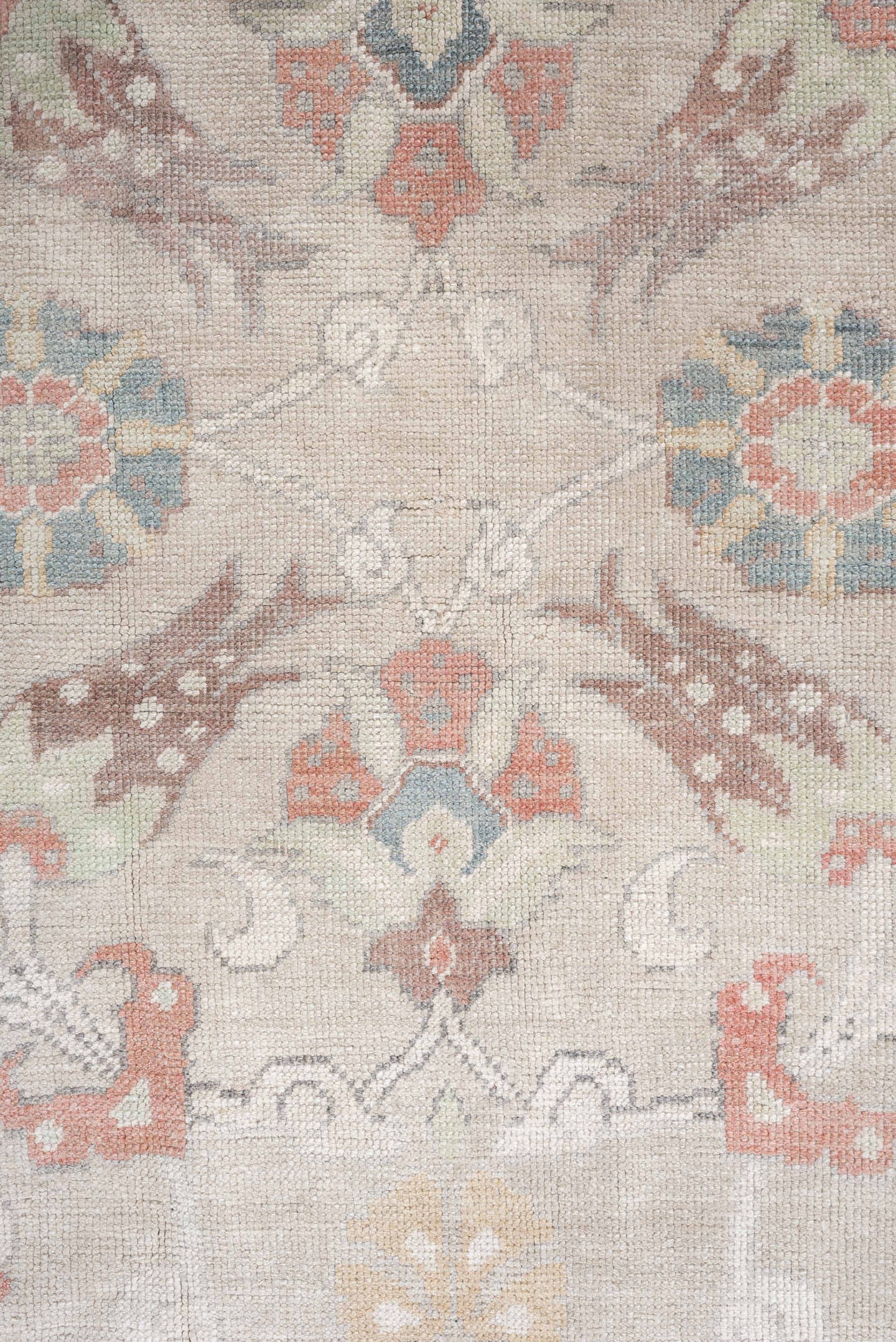 4' x 8' one-of-a-kind handmade antique Oushak rug. Color palette: taupe, ivory, pale blue, coral, soft gold, rose, sage