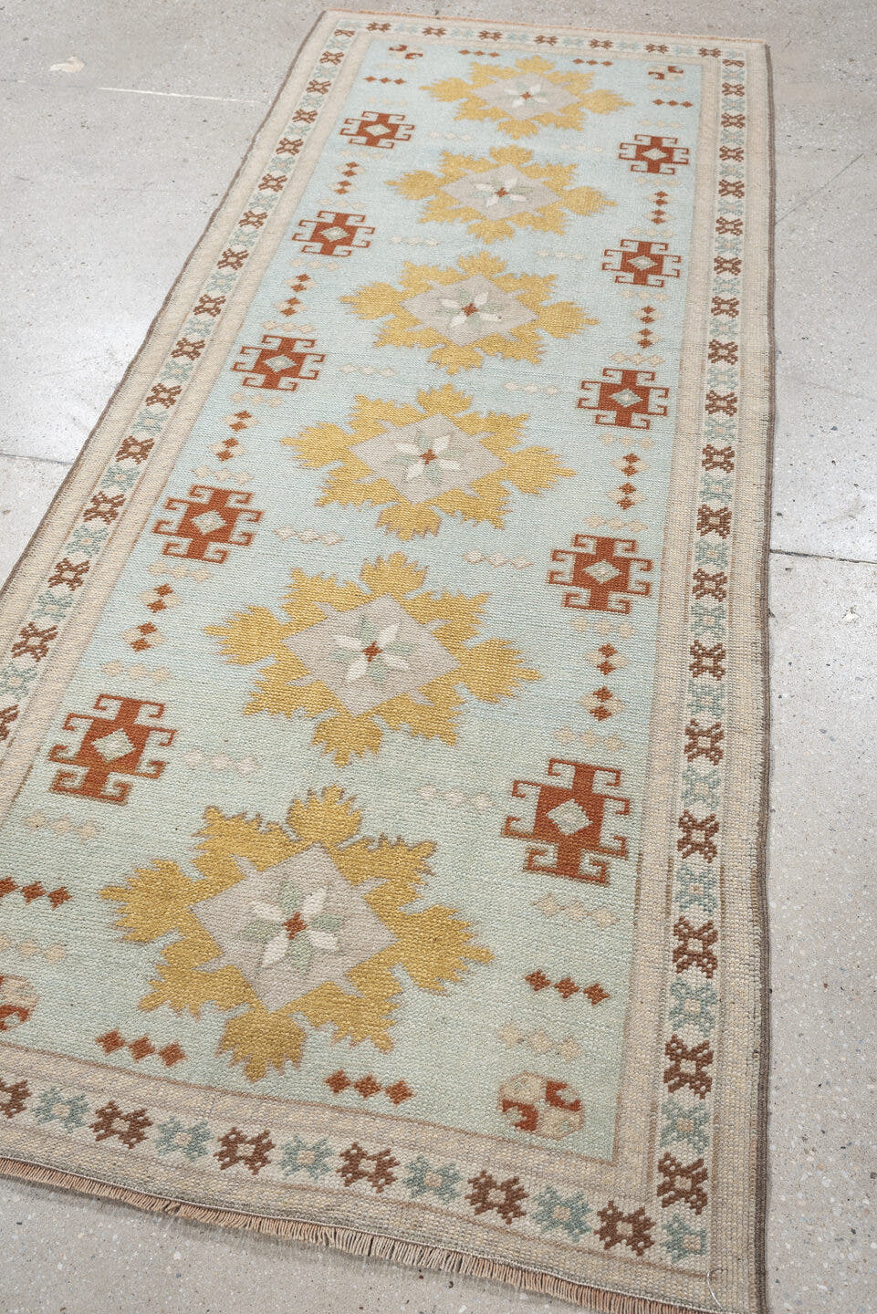 2' x 8' one-of-a-kind handmade vintage Oushak runner rug. Color palette: pale blue, ivory, gold, rust, taupe, sage