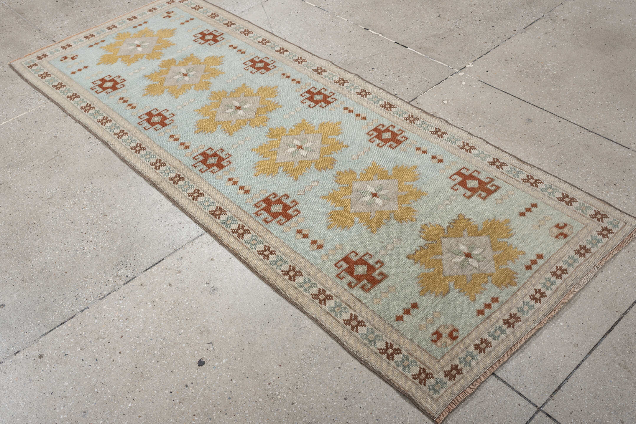 2' x 8' one-of-a-kind handmade vintage Oushak runner rug. Color palette: pale blue, ivory, gold, rust, taupe, sage