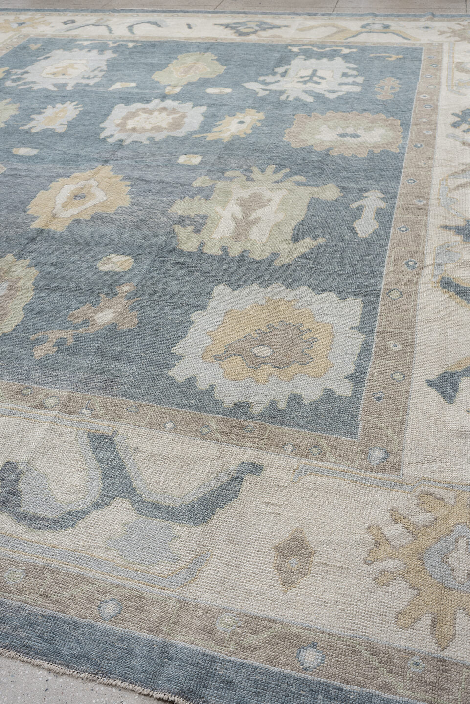 13' x 16' one-of-a-kind handmade vintage Oushak oversize rug. Color palette: blue, ivory, beige, taupe, sage, gold, gray
