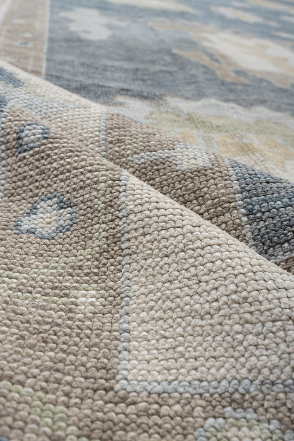 13' x 16' one-of-a-kind handmade vintage Oushak oversize rug. Color palette: blue, ivory, beige, taupe, sage, gold, gray