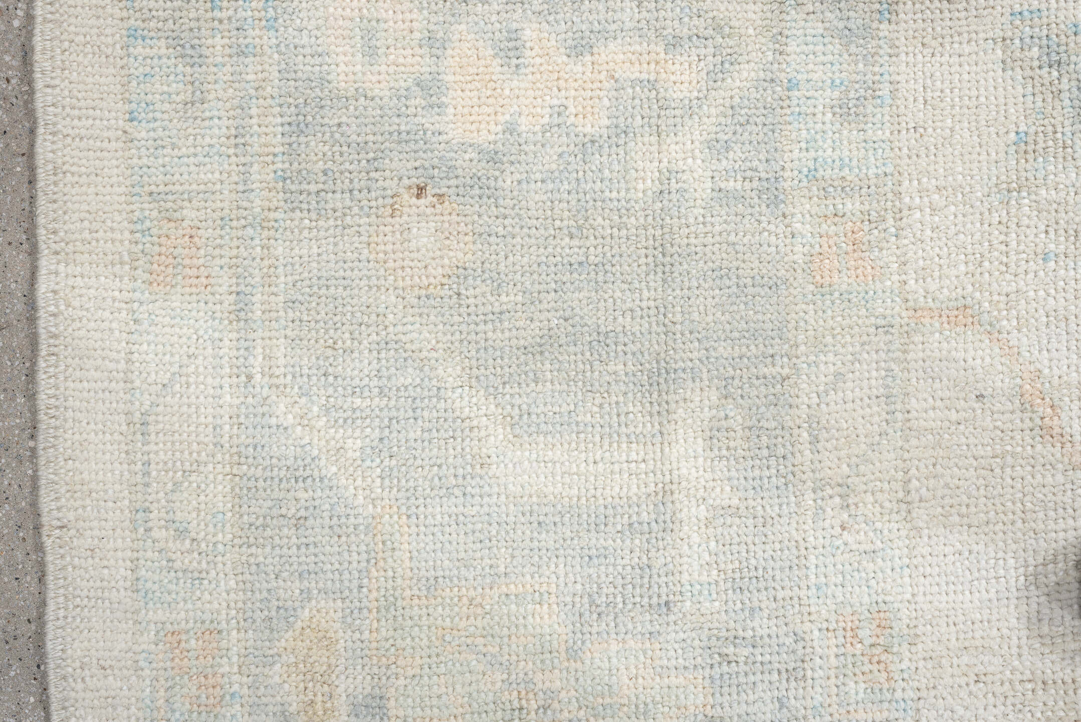 12' x 16' one-of-a-kind handmade vintage Oushak oversize rug. Color palette: ivory, pale blue, cream, taupe, blush, sage