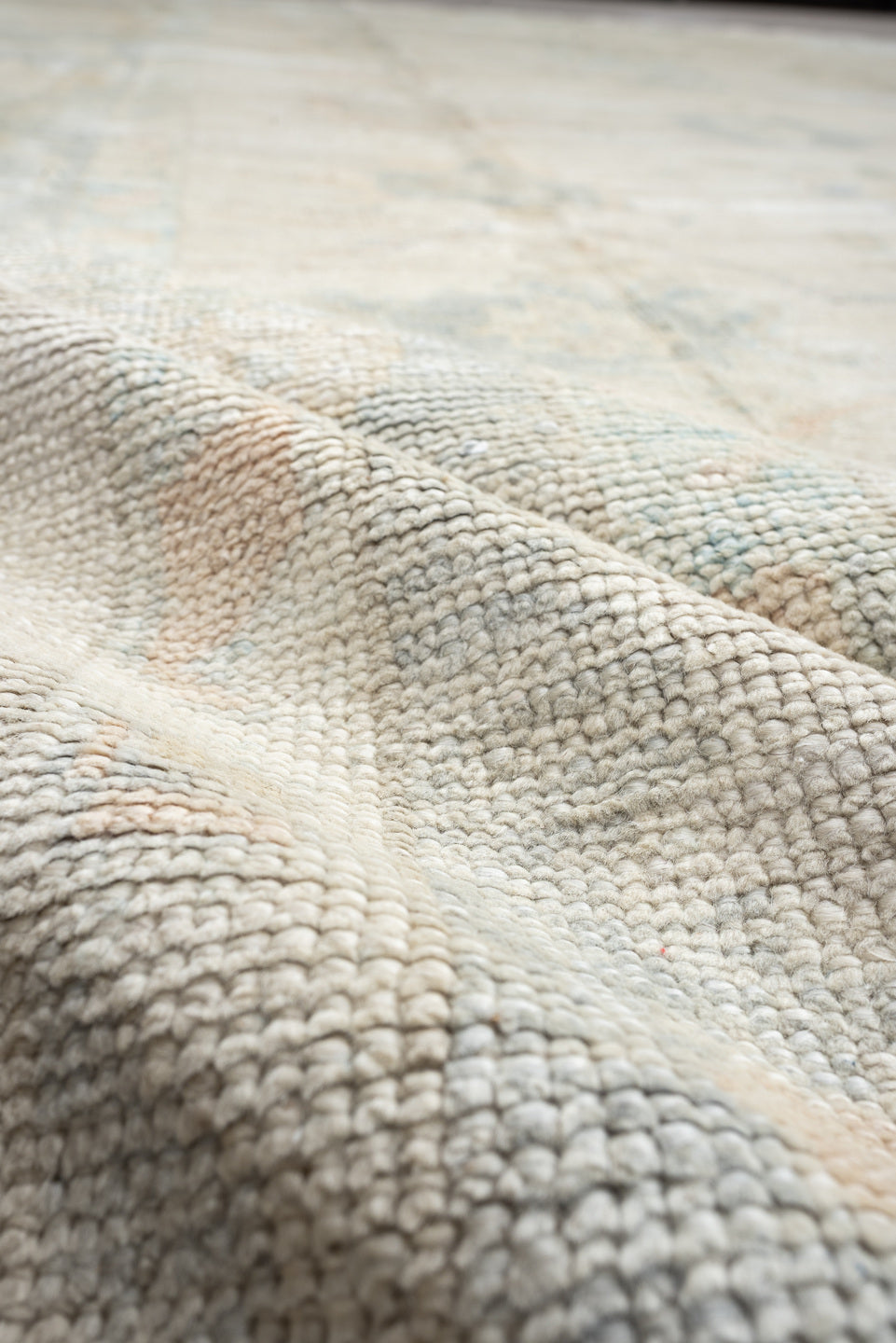 12' x 16' one-of-a-kind handmade vintage Oushak oversize rug. Color palette: ivory, pale blue, cream, taupe, blush, sage