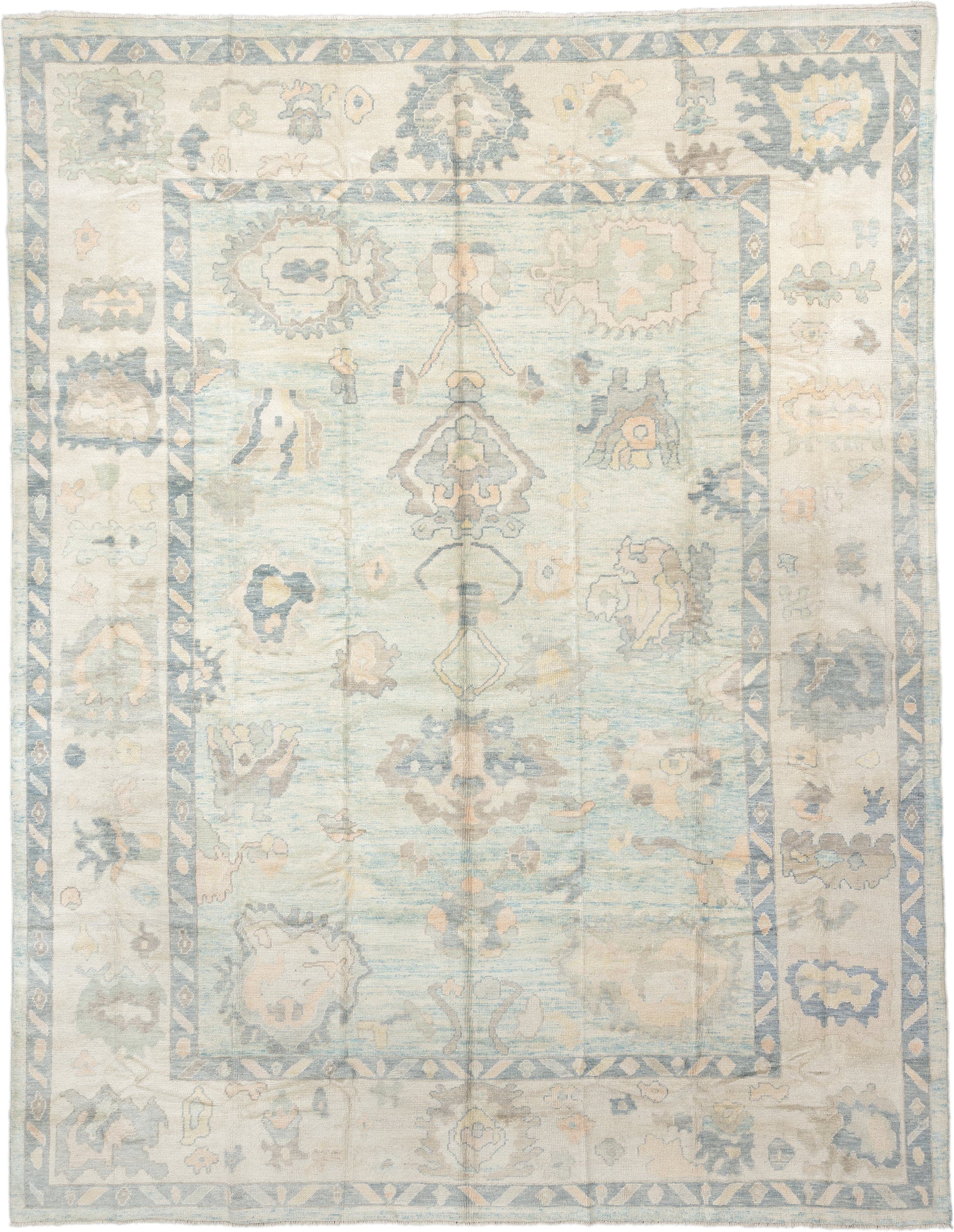 12' x 15' one-of-a-kind handmade vintage Oushak oversize rug. Color palette: ivory, pale blue, sky blue, taupe, beige, sage