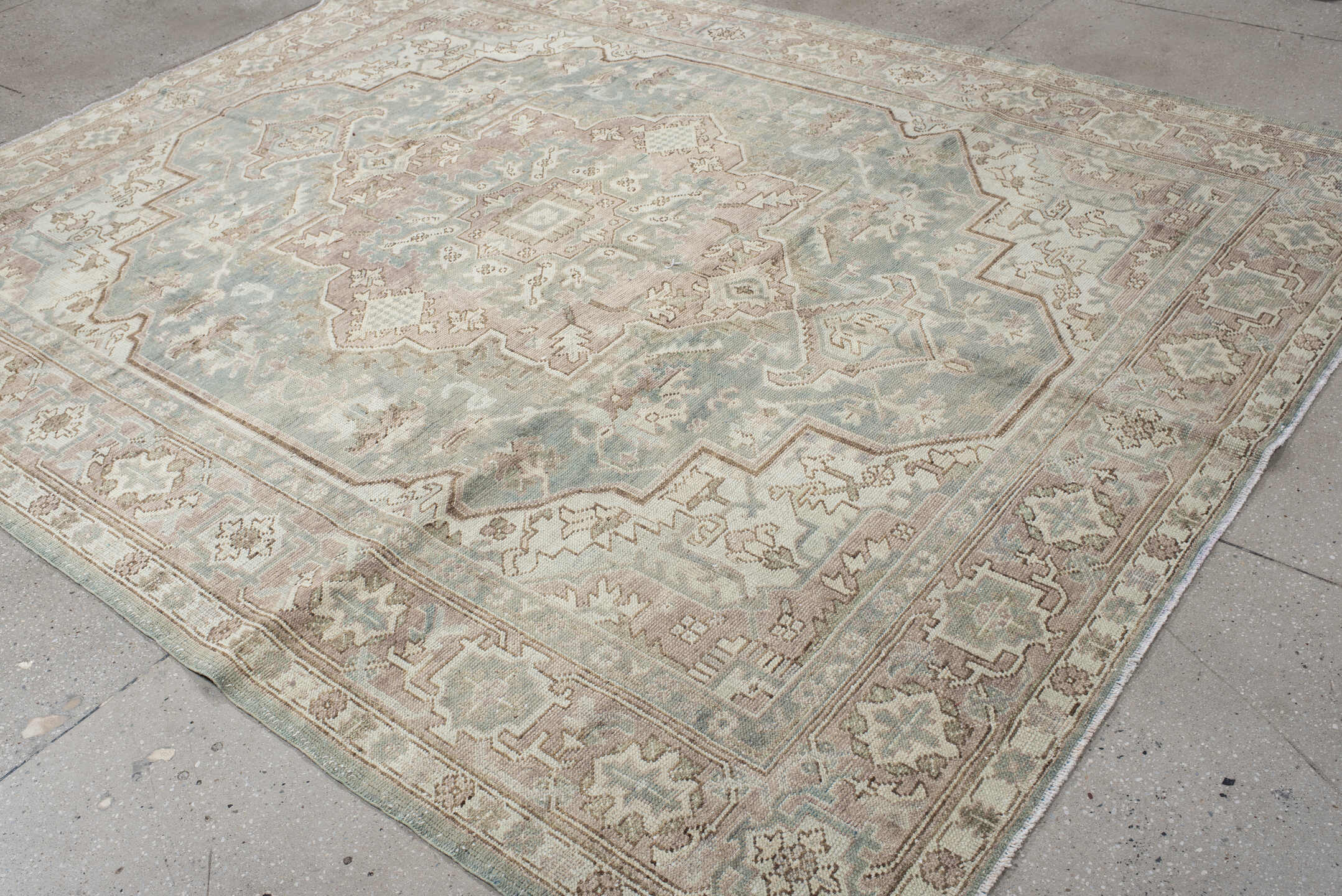7' x 9' one-of-a-kind handmade vintage Heriz large size rug. Color palette: ivory, pale blue, taupe, beige, blush, sage