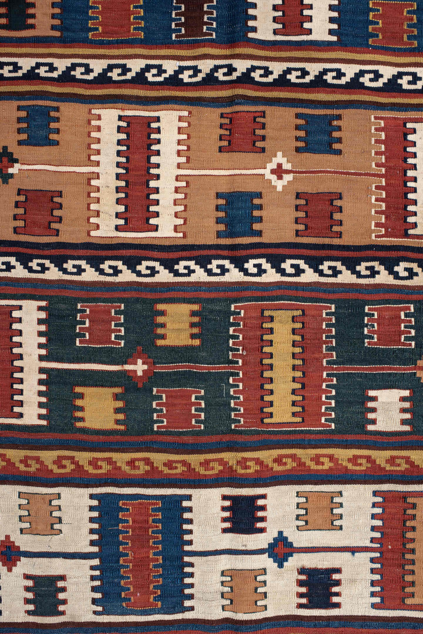 5' x 9' one-of-a-kind handmade vintage Kilim medium size rug. Color palette: rust, ivory, indigo, camel, teal, brown, navy