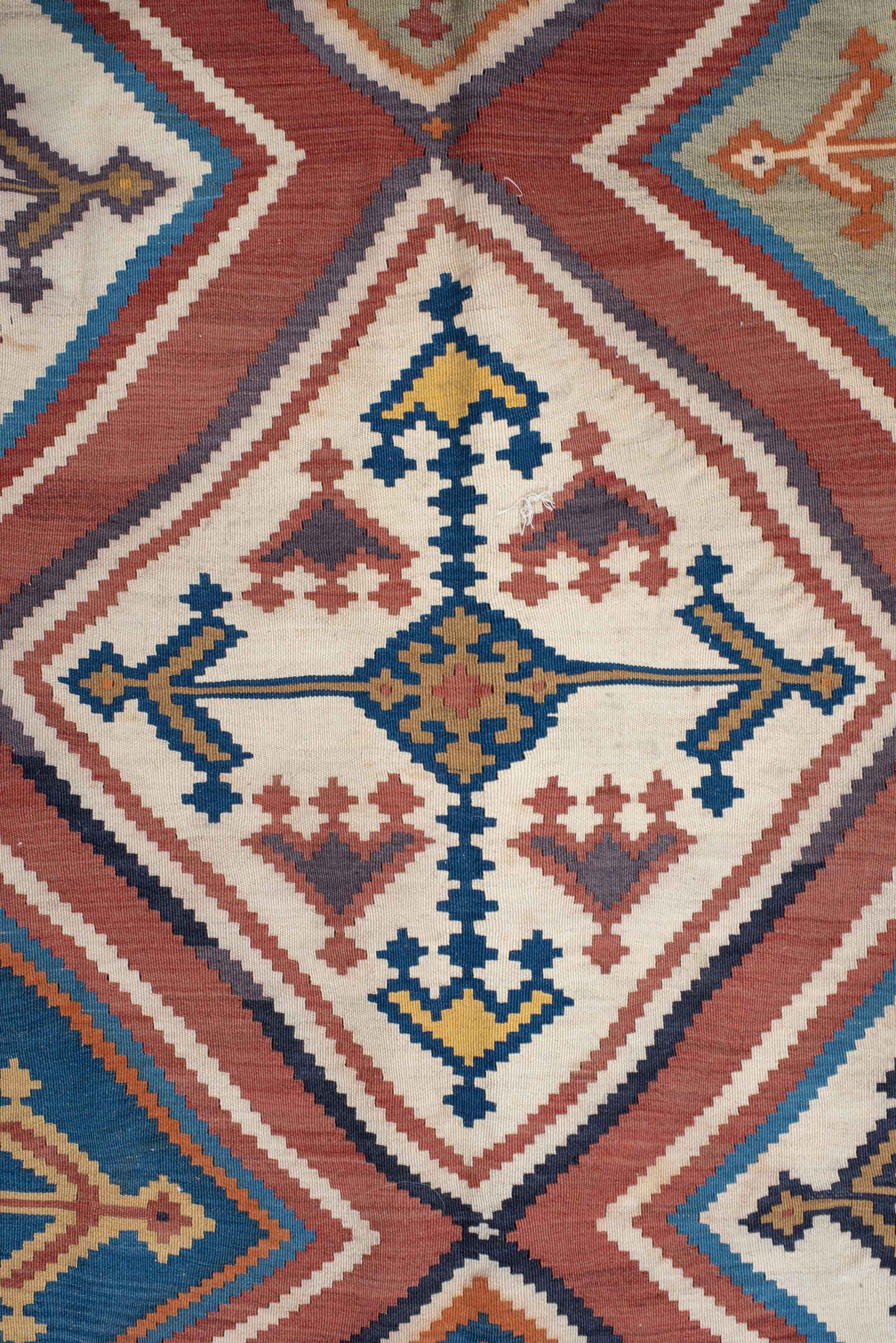5' x 9' one-of-a-kind handmade vintage Kilim medium size rug. Color palette: terra cotta, ivory, teal, rust, brown, navy