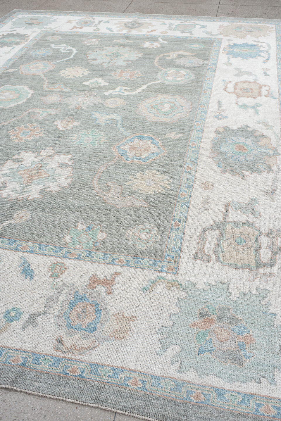 9' x 12' one-of-a-kind handmade vintage Oushak large size rug. Color palette: gray, ivory, pale aqua, taupe, blush, beige