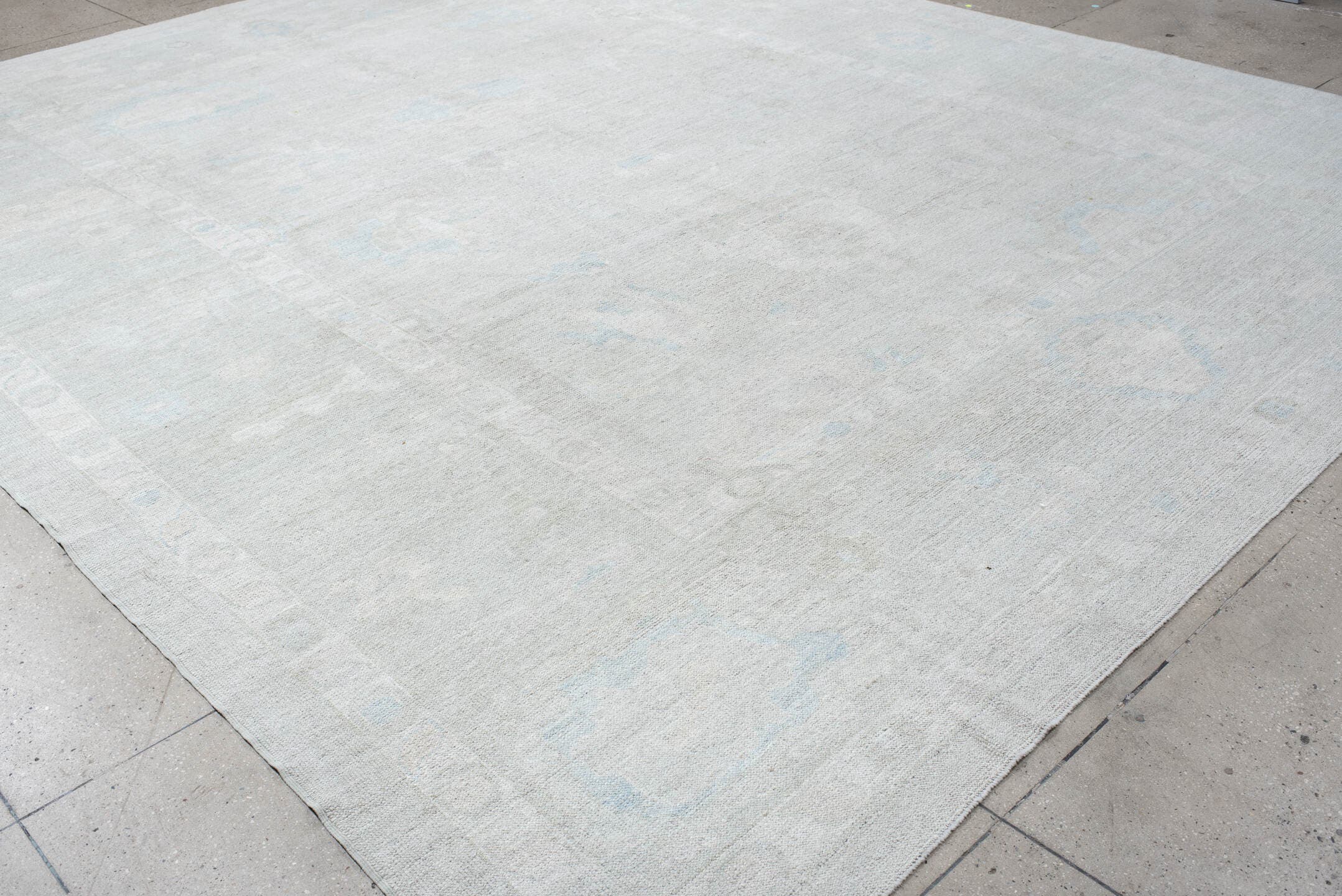 12' x 14' one-of-a-kind handmade vintage Oushak oversize rug. Color palette: ivory, pale blue, light gray, cream, light blue