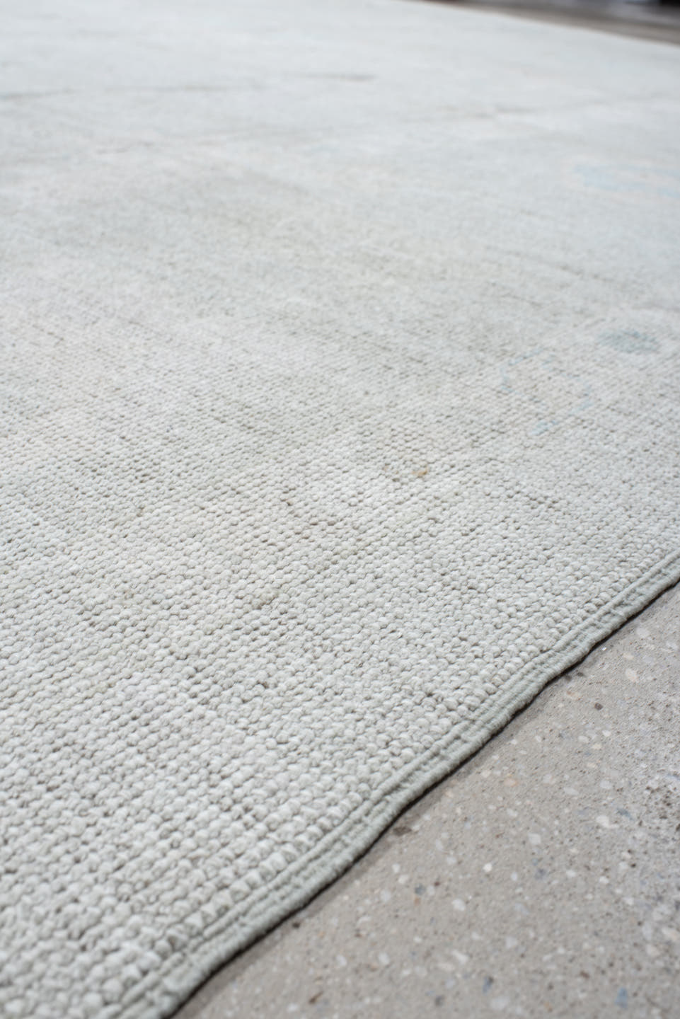 12' x 14' one-of-a-kind handmade vintage Oushak oversize rug. Color palette: ivory, pale blue, light gray, cream, light blue