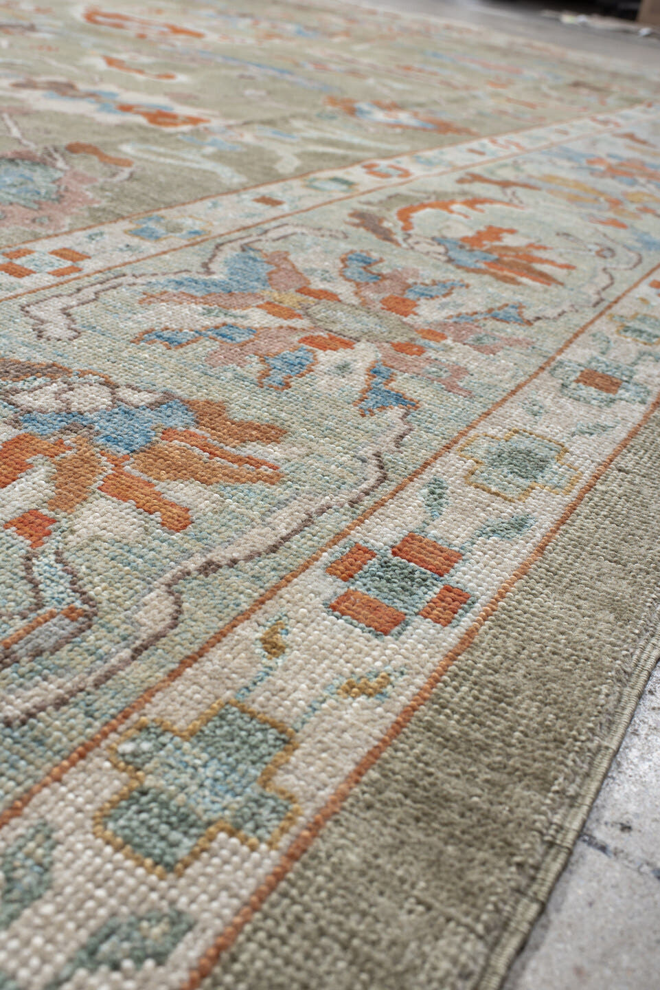 10' x 13' one-of-a-kind handmade vintage Sultanabad large size rug. Color palette: sage, ivory, sky blue, coral, taupe