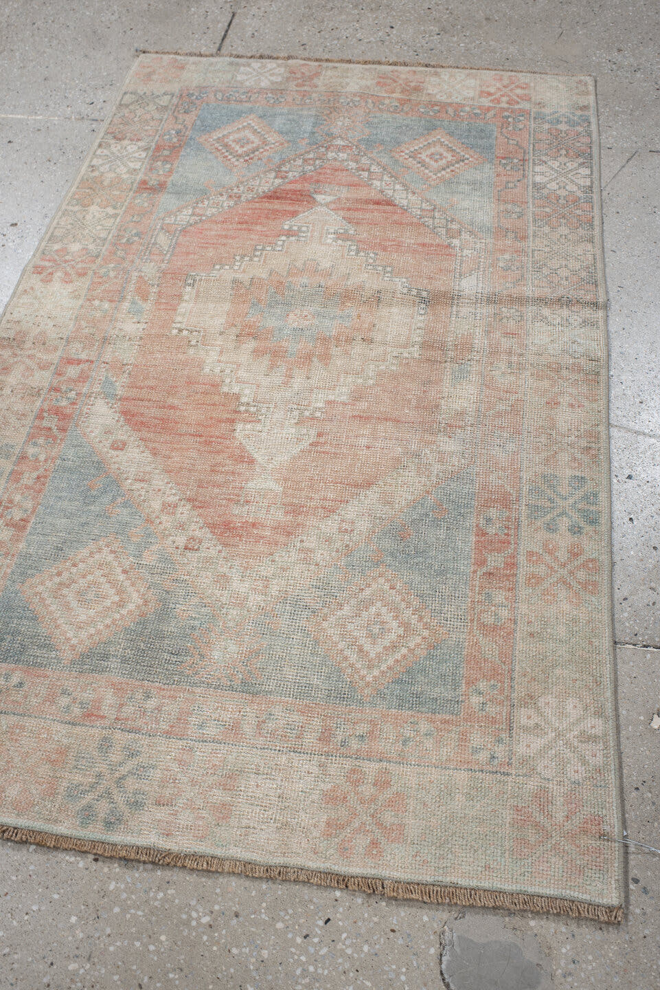 2' x 4' one-of-a-kind handmade vintage Anatolian small size rug. Color palette: ivory, pale blue, blush, peach, taupe, sage