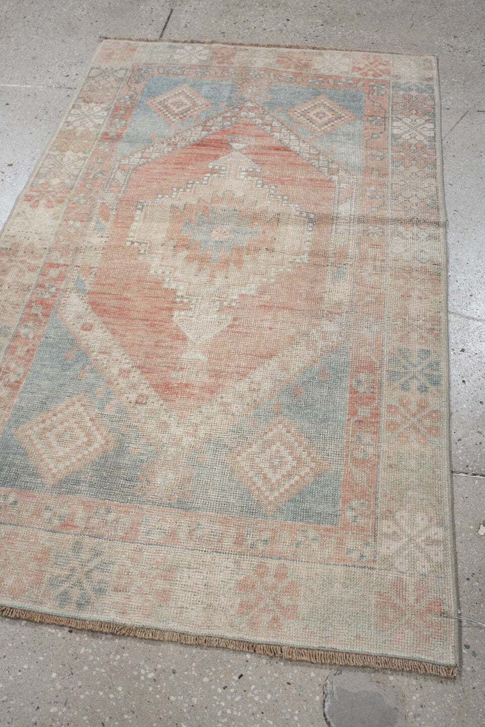 2' x 4' one-of-a-kind handmade vintage Anatolian small size rug. Color palette: ivory, pale blue, blush, peach, taupe, sage