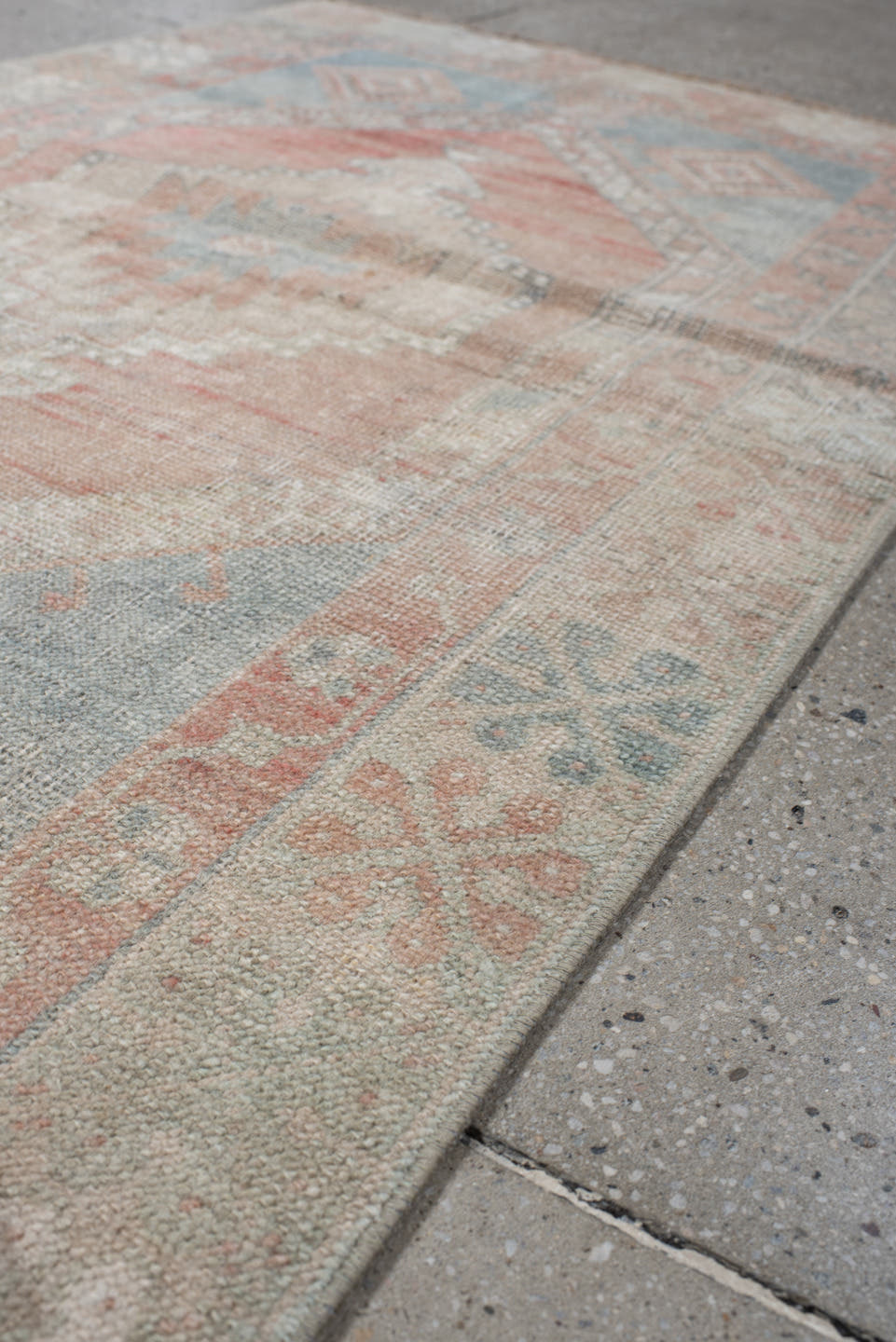 2' x 4' one-of-a-kind handmade vintage Anatolian small size rug. Color palette: ivory, pale blue, blush, peach, taupe, sage