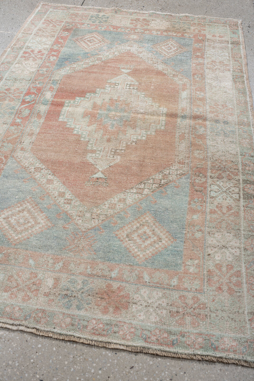 3' x 5' one-of-a-kind handmade vintage Anatolian small size rug. Color palette: ivory, pale blue, blush, coral, taupe, sage
