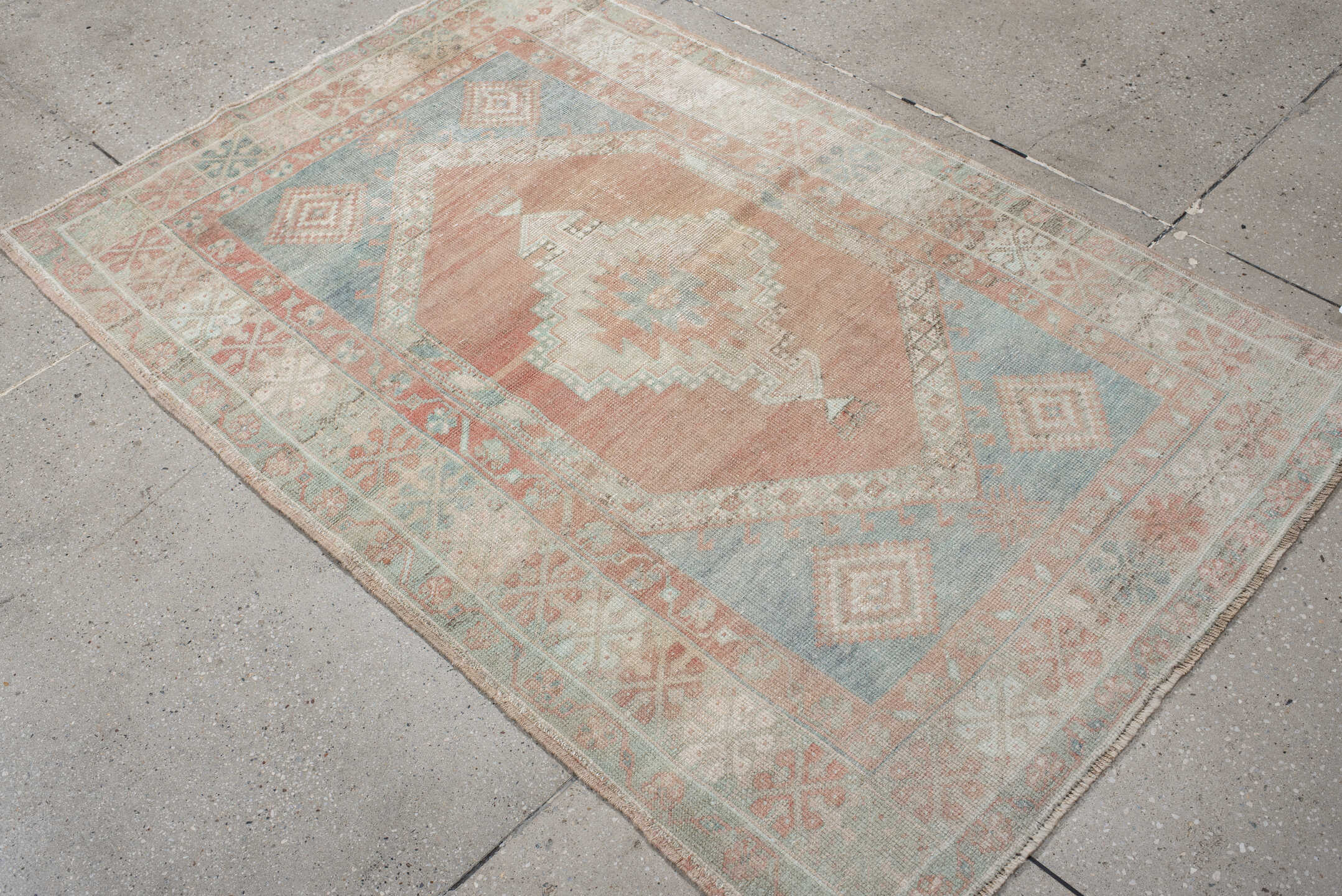 3' x 5' one-of-a-kind handmade vintage Anatolian small size rug. Color palette: ivory, pale blue, blush, coral, taupe, sage
