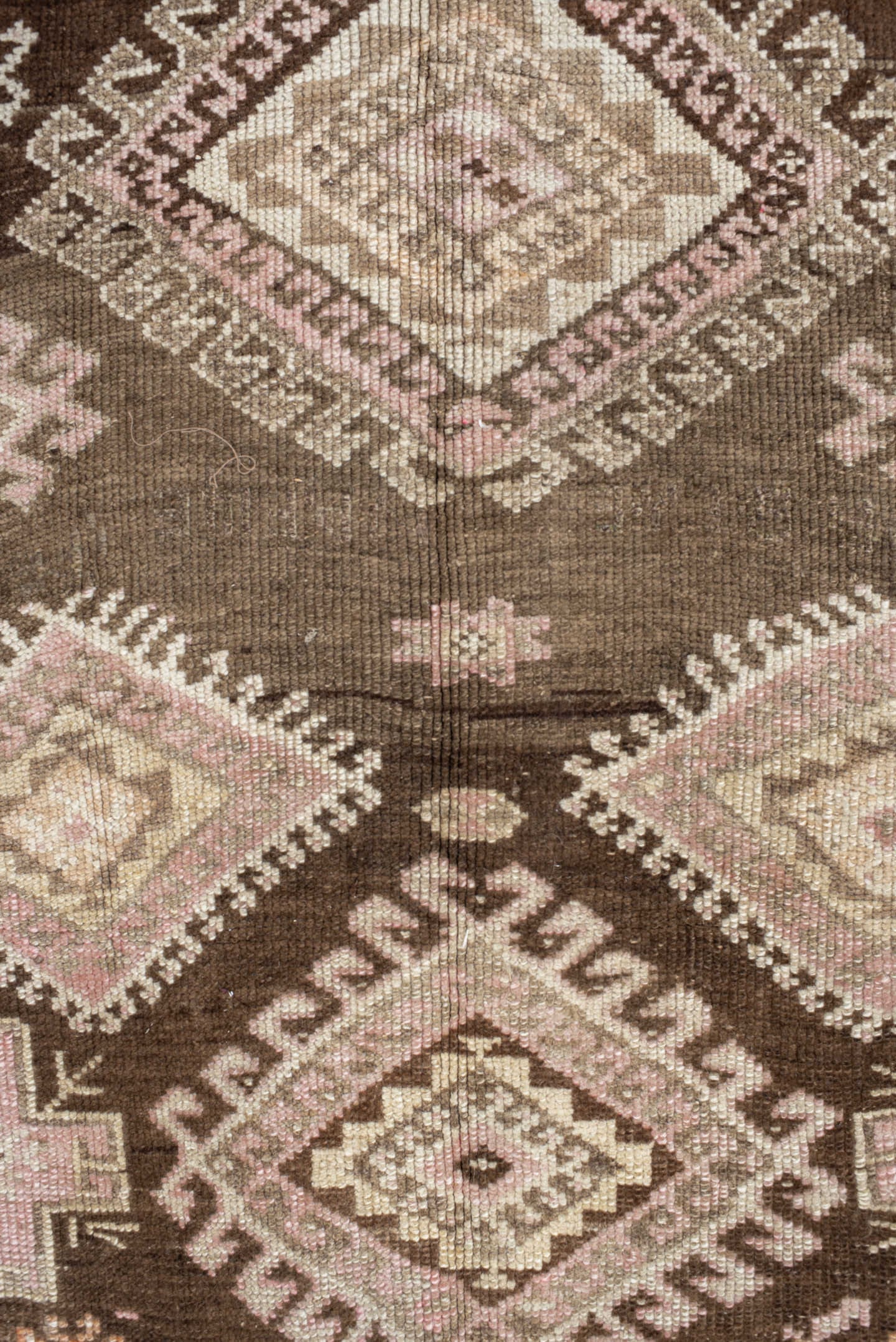 4' x 11' one-of-a-kind handmade vintage Kars runner rug. Color palette: brown, taupe, ivory, blush, beige, camel, charcoal