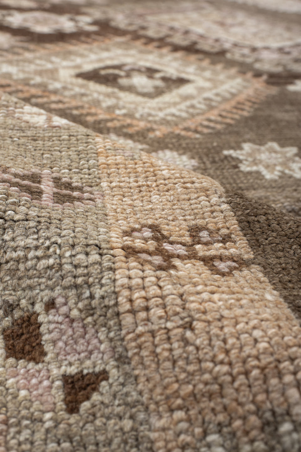 4' x 11' one-of-a-kind handmade vintage Kars runner rug. Color palette: brown, taupe, ivory, blush, beige, camel, charcoal