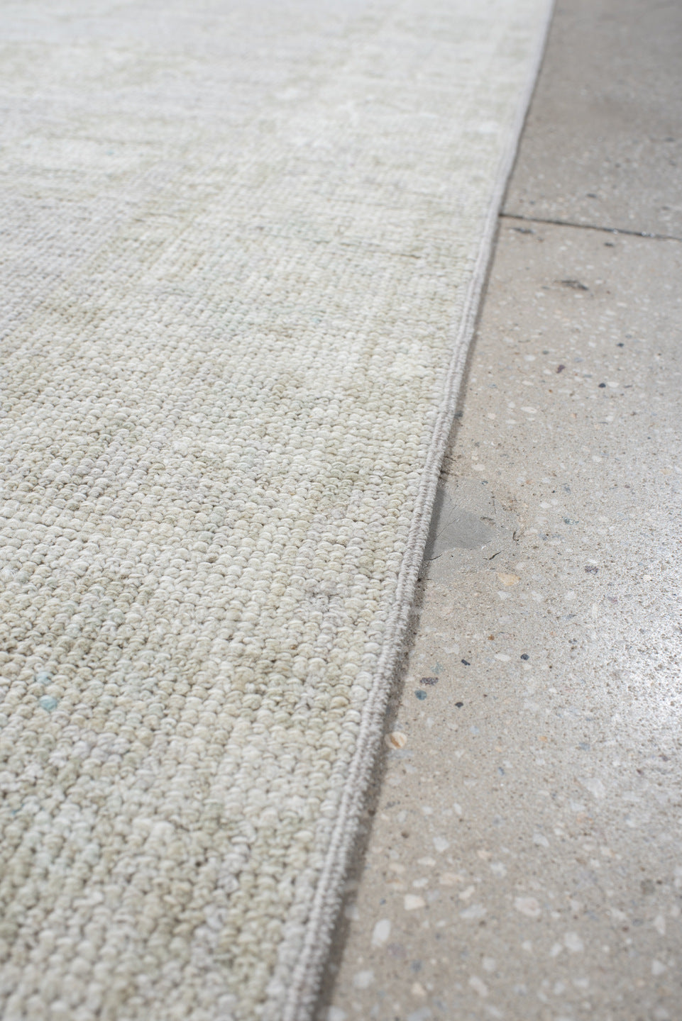 2' x 9' one-of-a-kind handmade antique Oushak runner rug. Color palette: ivory, cream, taupe, beige, pale sage, gray, green