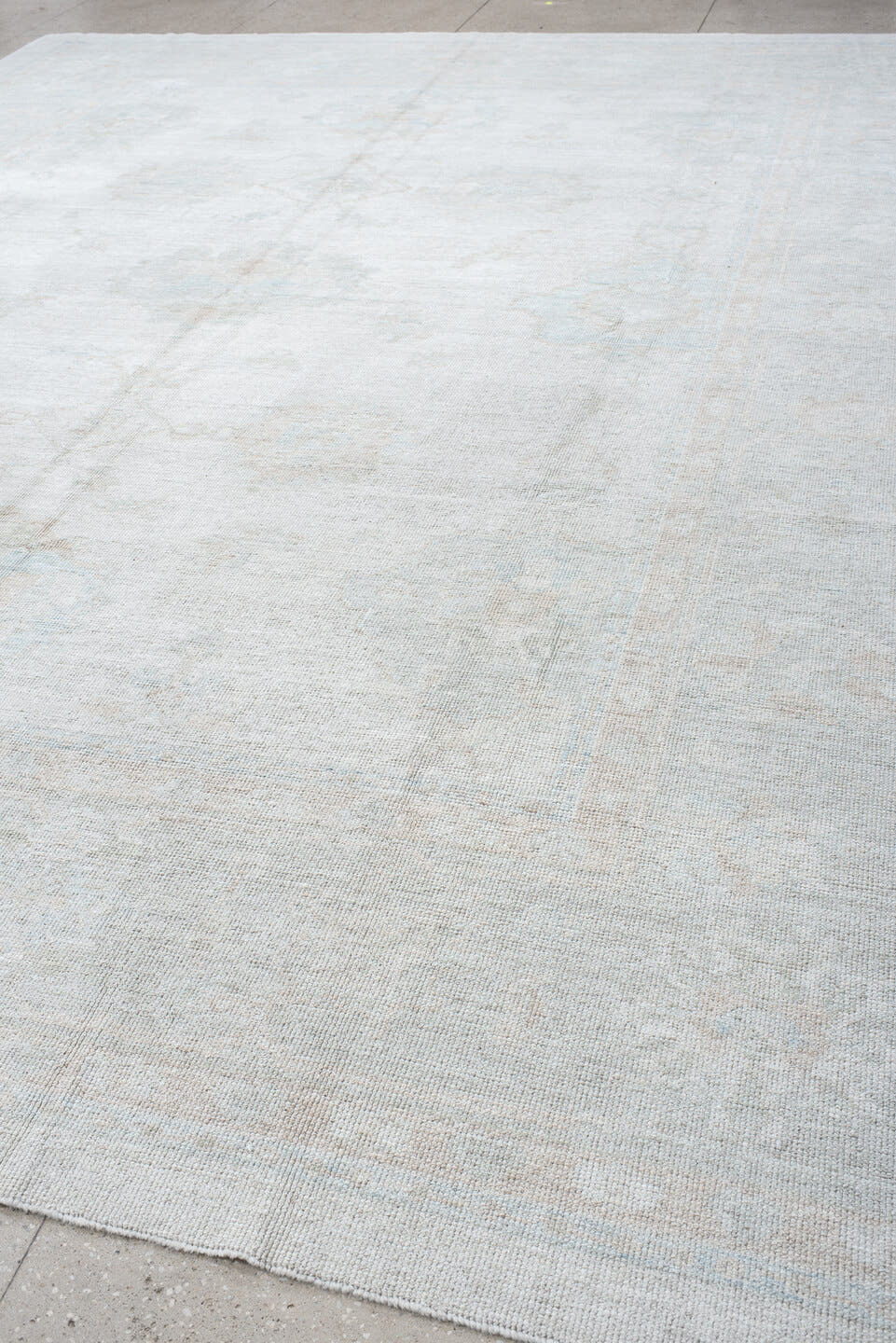 12' x 15' one-of-a-kind handmade vintage Oushak oversize rug. Color palette: ivory, pale blue, taupe, cream, sage