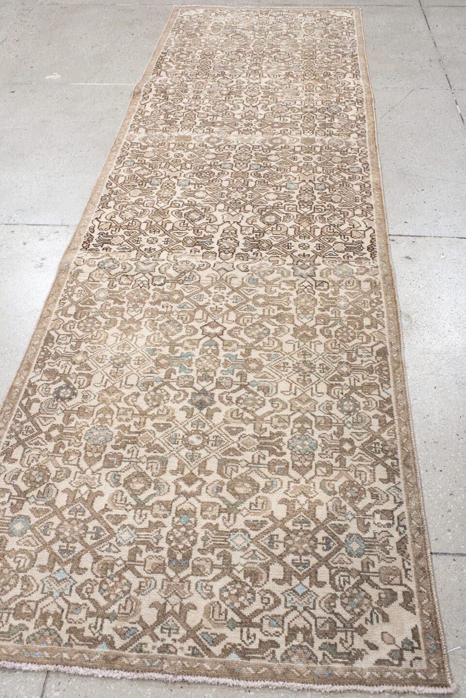 2' x 10' one-of-a-kind handmade antique Hamadan runner rug. Color palette: ivory, taupe, camel, beige, pale blue, brown
