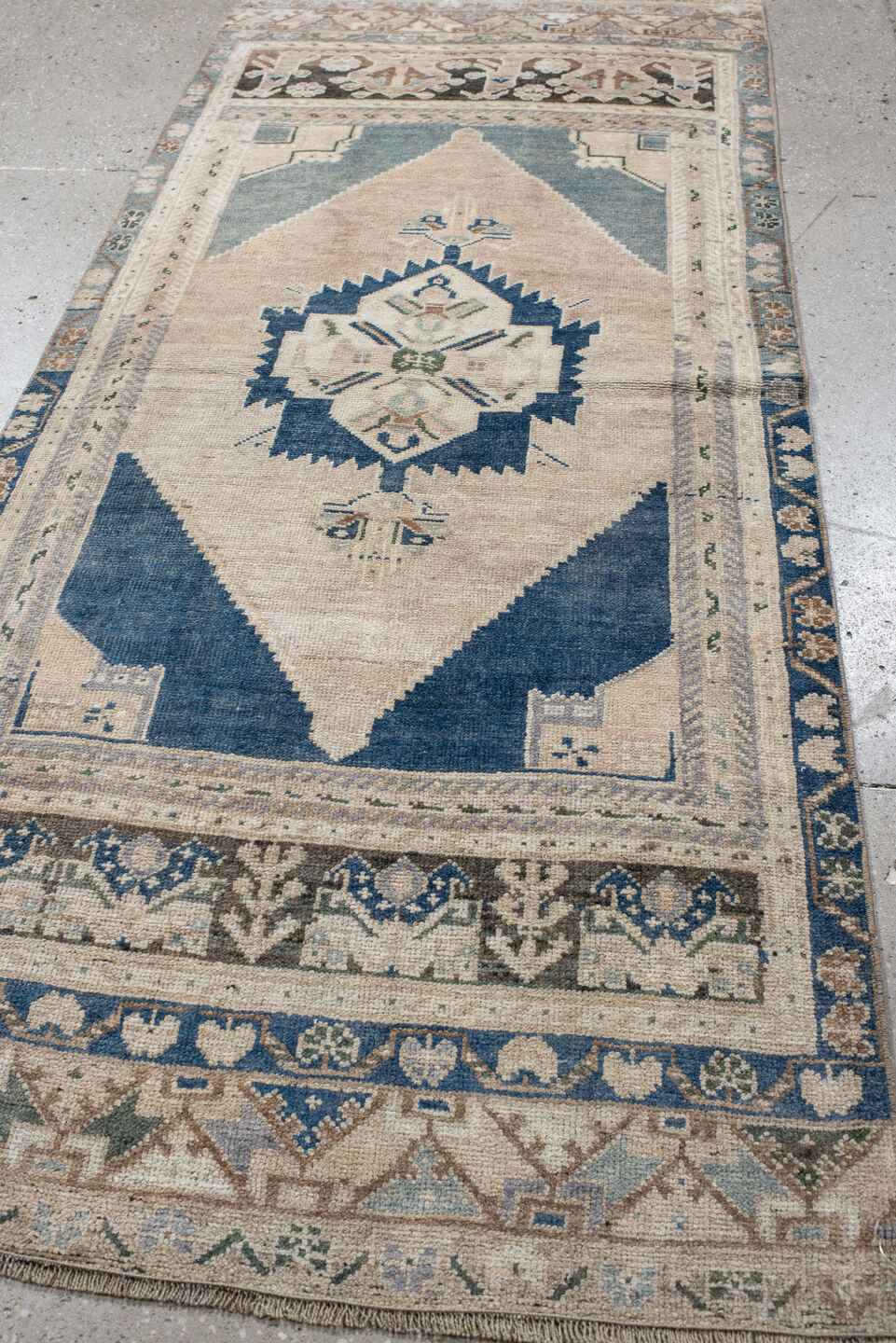 2' x 6' one-of-a-kind handmade vintage Anatolian runner rug. Color palette: ivory, indigo, beige, sky_blue, taupe, blush