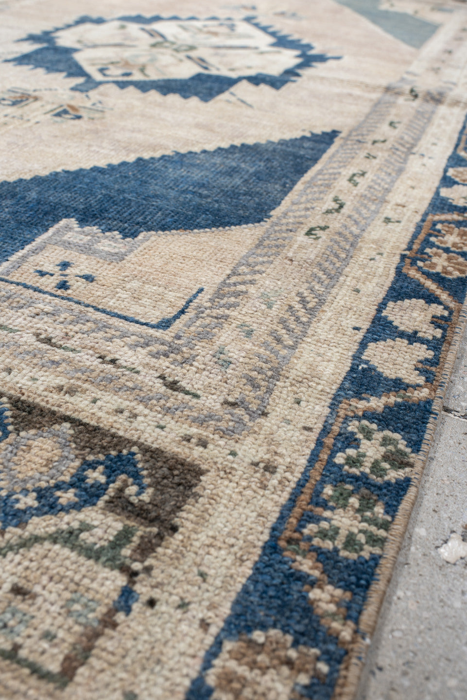 2' x 6' one-of-a-kind handmade vintage Anatolian runner rug. Color palette: ivory, indigo, beige, sky_blue, taupe, blush