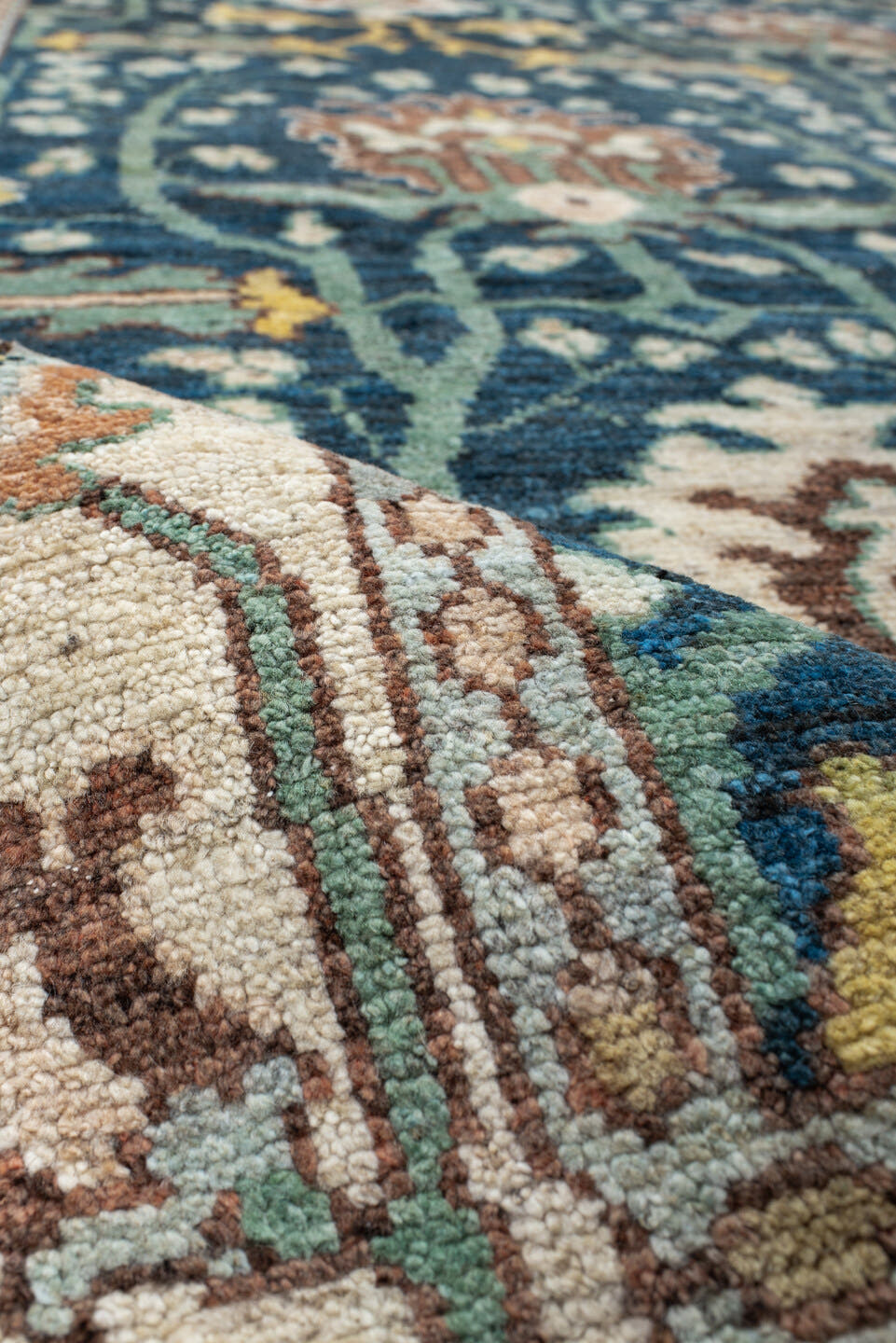 10' x 13' one-of-a-kind handmade vintage Arts & Crafts large size rug. Color palette: blue, ivory, teal, sage, rust, gold