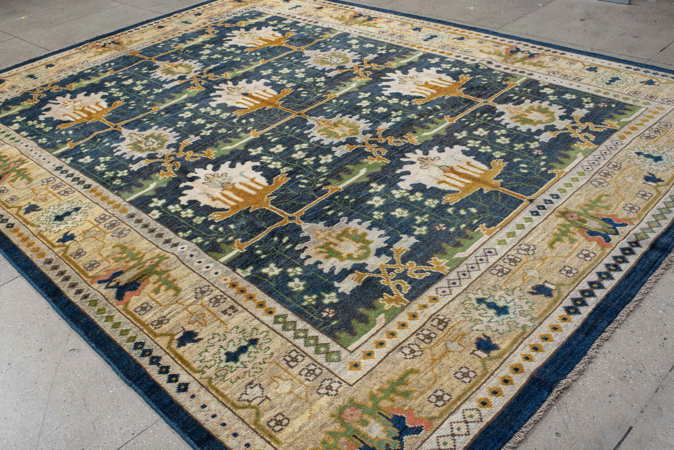 10' x 13' one-of-a-kind handmade vintage Arts & Crafts large size rug. Color palette: navy, ivory, gold, sage, olive, camel