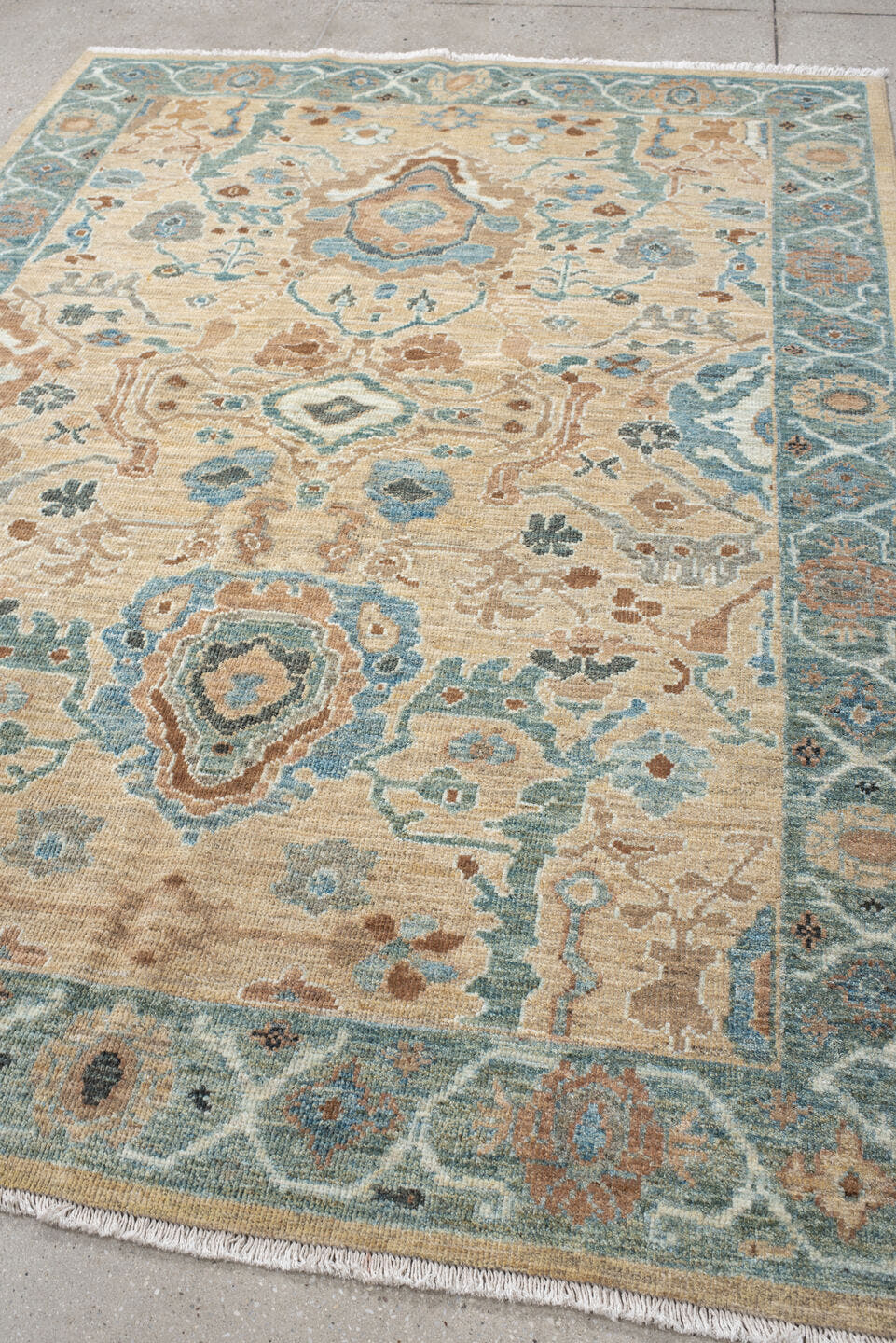 5' x 7' one-of-a-kind handmade vintage Sultanabad rug. Color palette: beige, aqua, ivory, taupe, terracotta, slate, camel