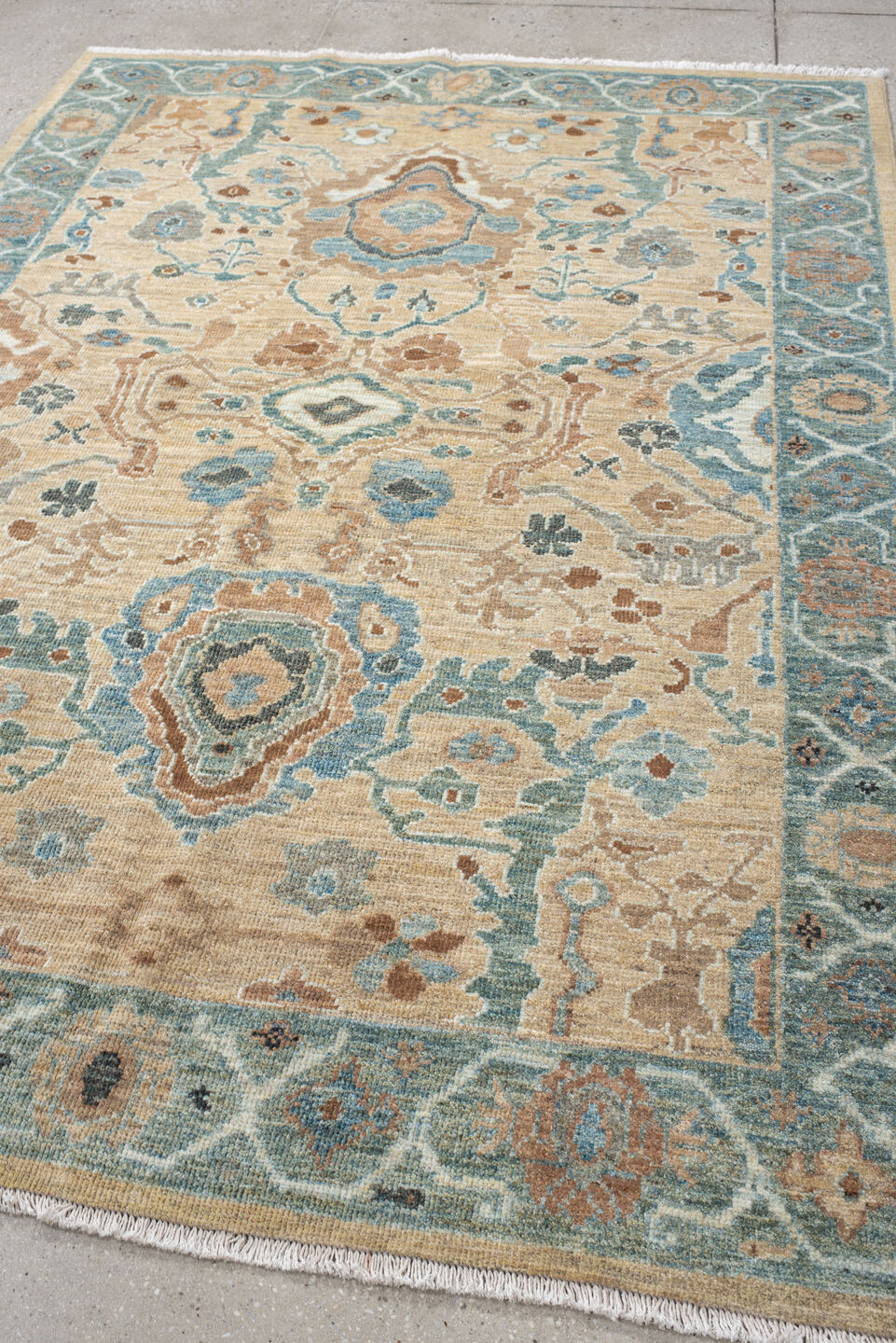 5' x 7' one-of-a-kind handmade vintage Sultanabad rug. Color palette: beige, aqua, ivory, taupe, terracotta, slate, camel