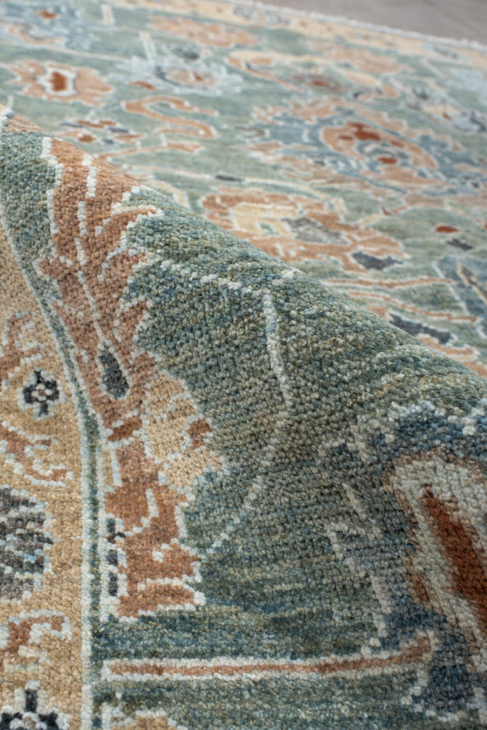 5' x 7' one-of-a-kind handmade vintage Sultanabad rug. Color palette: sage, ivory, peach, slate, rust, cream, charcoal