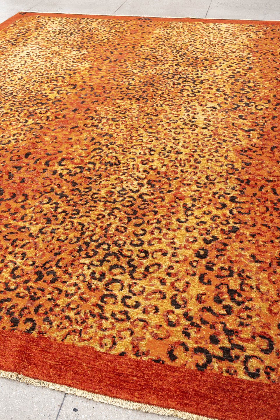 8' x 11' one-of-a-kind handmade vintage Tiger large size rug. Color palette: terra cotta, camel, charcoal, rust, gold