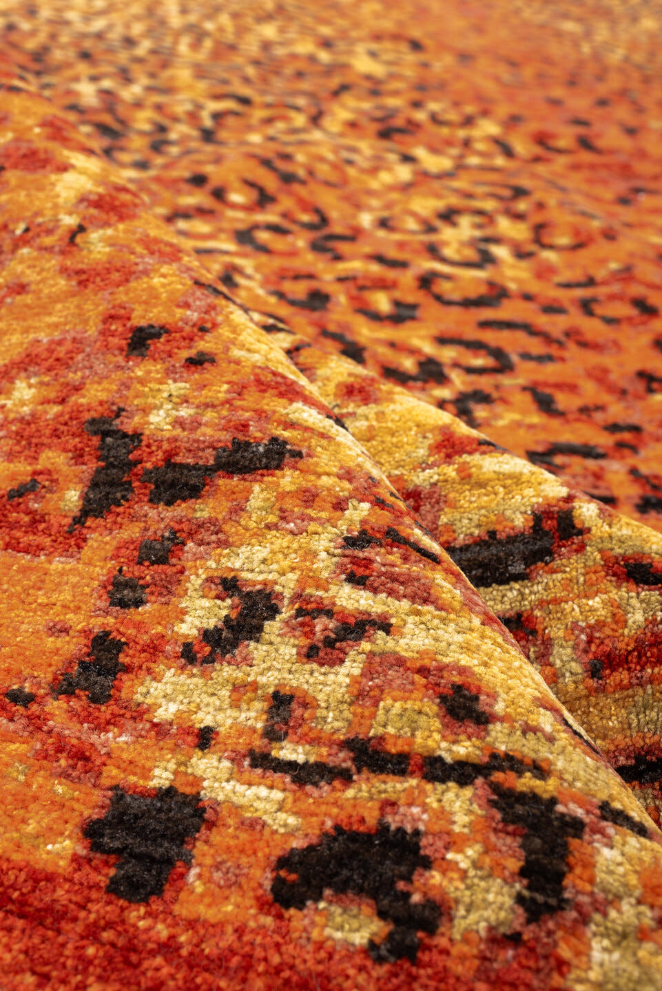 8' x 11' one-of-a-kind handmade vintage Tiger large size rug. Color palette: terra cotta, camel, charcoal, rust, gold