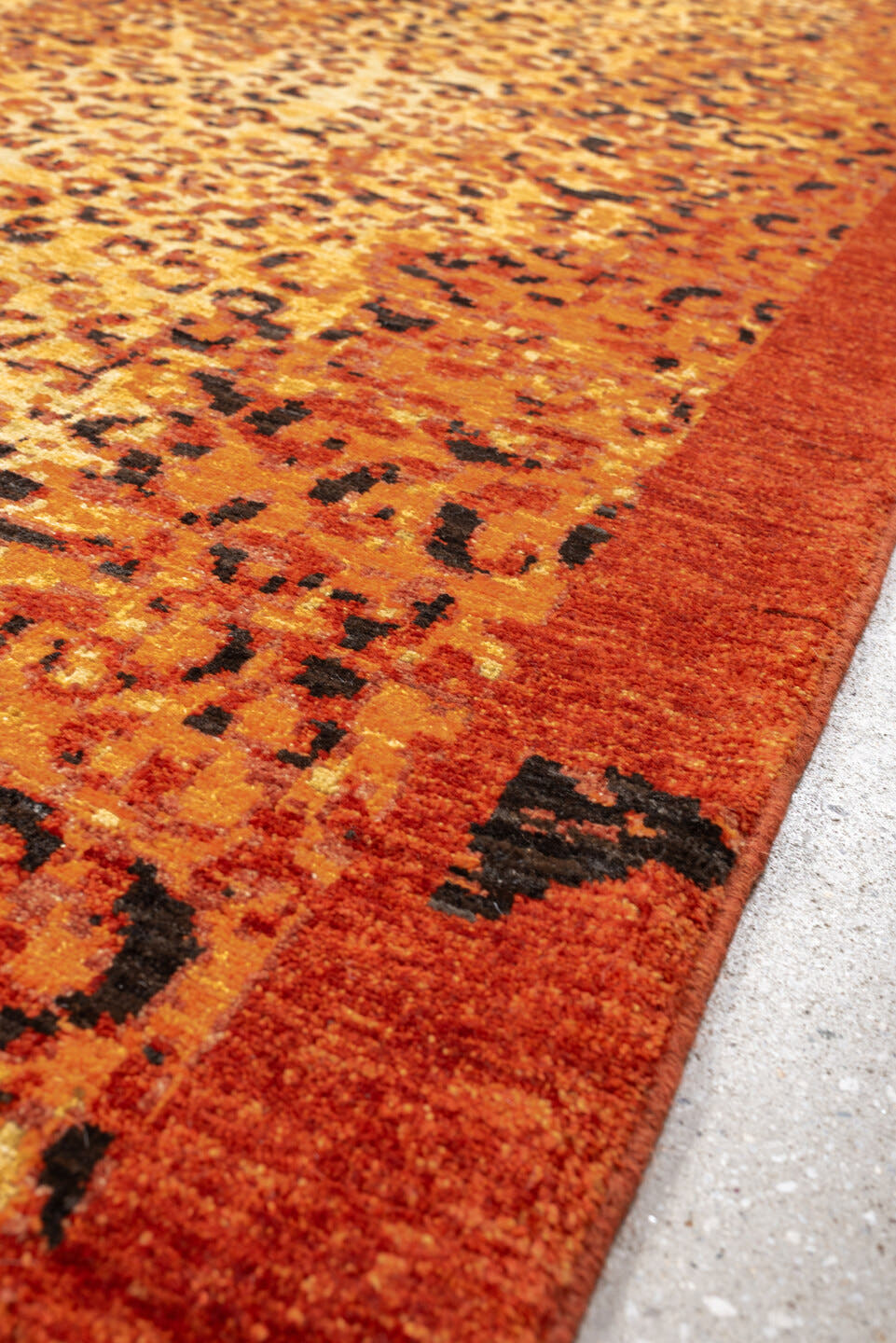 8' x 11' one-of-a-kind handmade vintage Tiger large size rug. Color palette: terra cotta, camel, charcoal, rust, gold