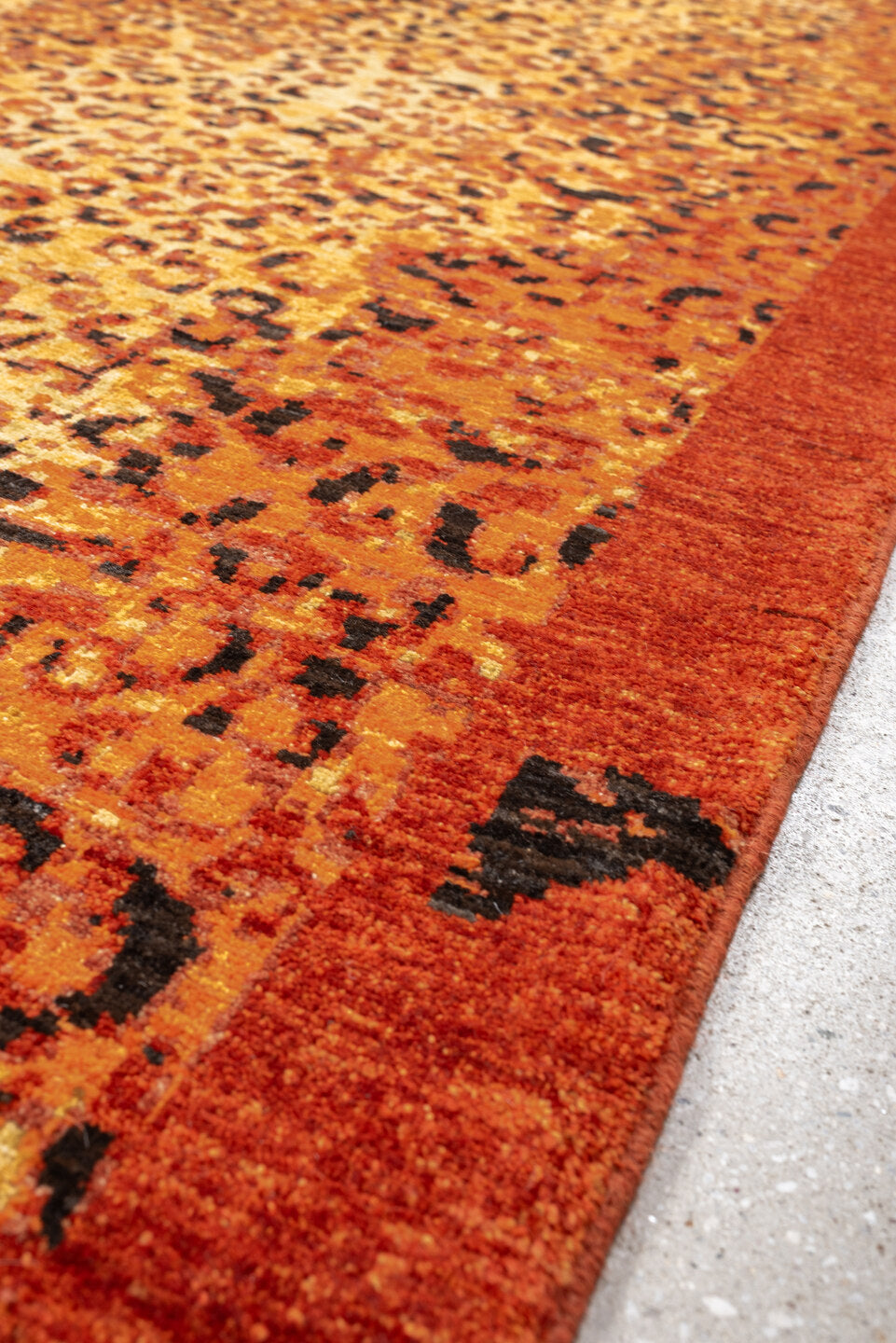 8' x 11' one-of-a-kind handmade vintage Tiger large size rug. Color palette: terra cotta, camel, charcoal, rust, gold