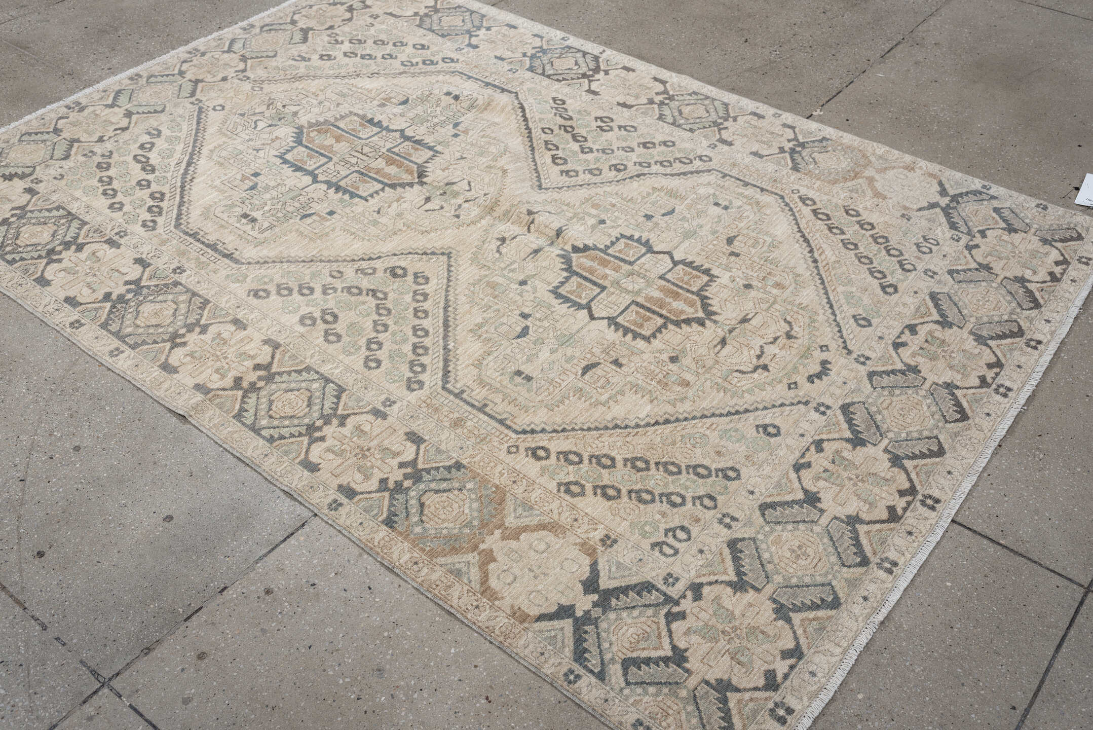 5' x 7' one-of-a-kind handmade vintage Afshar rug. Color palette: ivory, charcoal, sage, sand, taupe, camel, black, gray