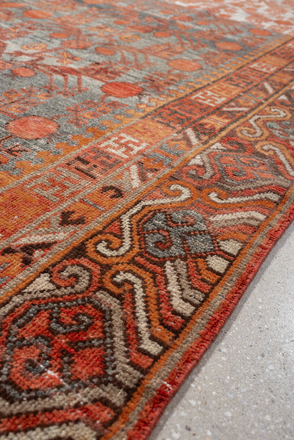 6' x 13' one-of-a-kind handmade antique Khotan large size rug. Color palette: slate, terra cotta, rust, ivory, charcoal