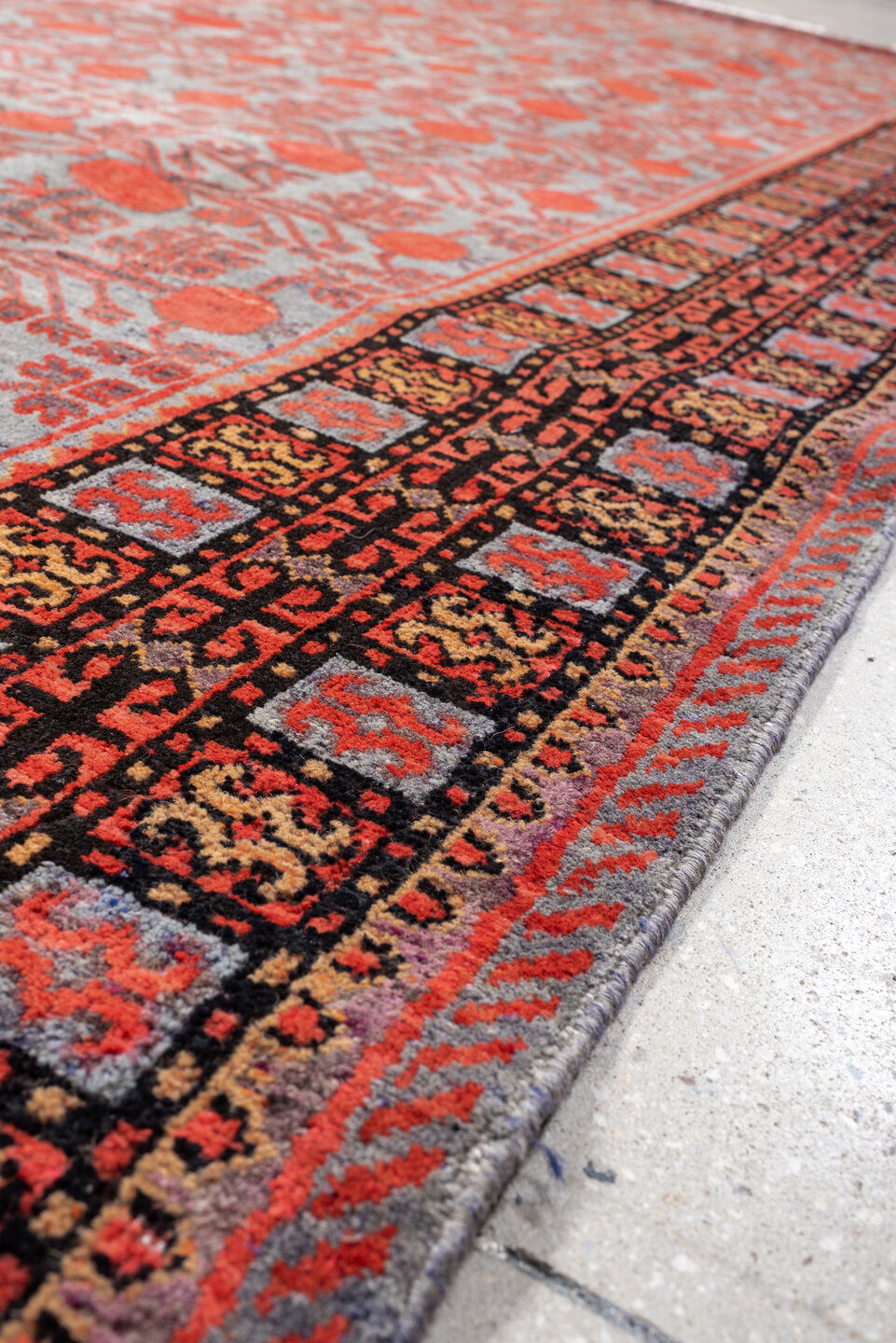 7' x 13' one-of-a-kind handmade antique Khotan large size rug. Color palette: rose, terracotta, indigo, ivory, coral