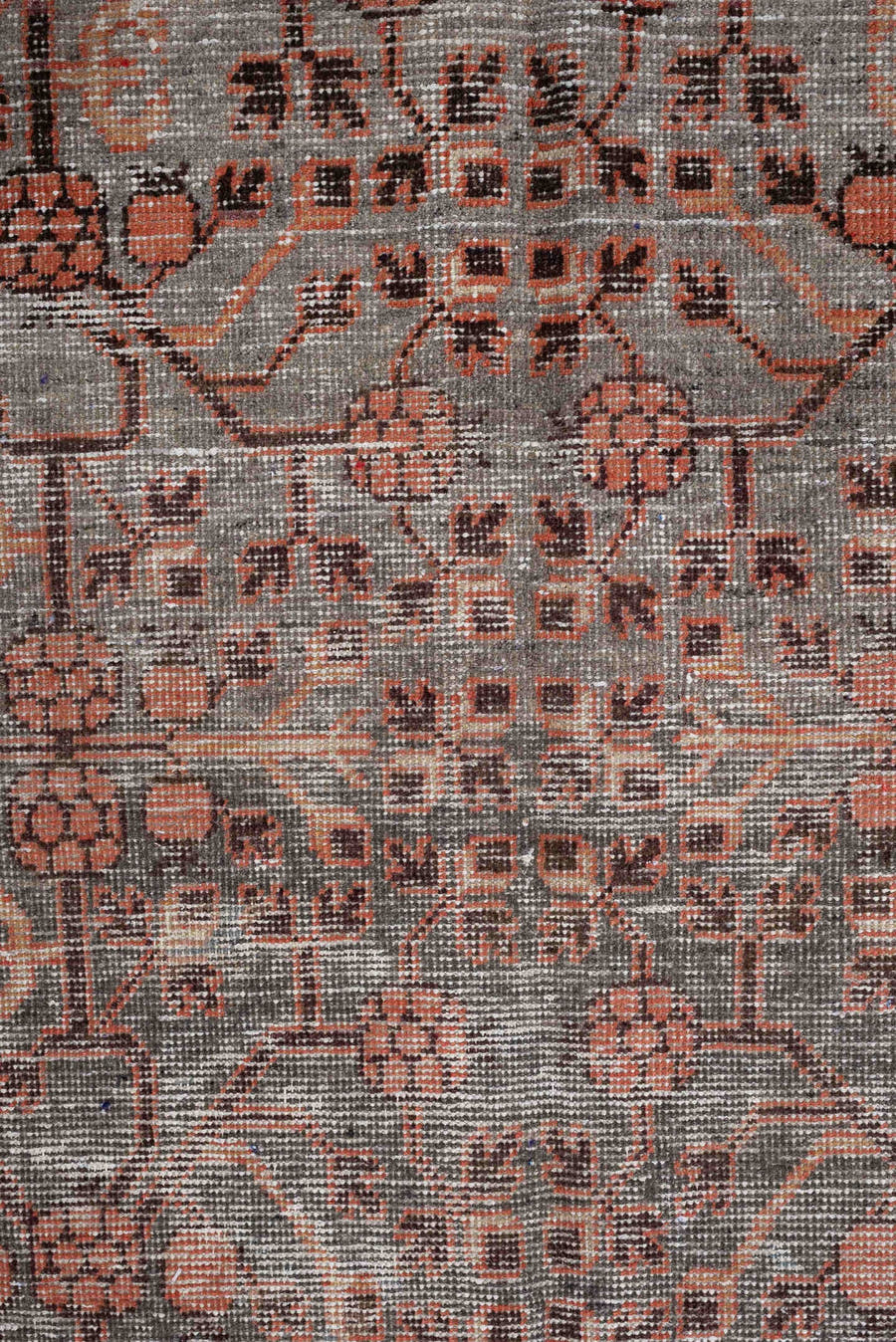 4' x 7' one-of-a-kind handmade antique rug. Color palette: charcoal, coral, ivory, taupe, slate, terra cotta, brown, black