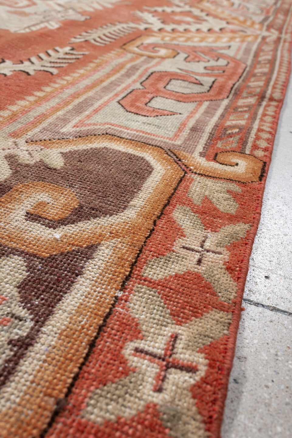 5' x 10' one-of-a-kind handmade antique Khotan large size rug. Color palette: coral, ivory, taupe, chocolate_brown, peach