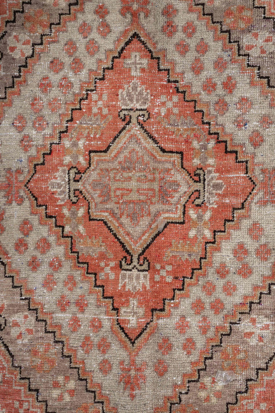 5' x 10' one-of-a-kind handmade antique Khotan large size rug. Color palette: coral, ivory, taupe, charcoal, sand