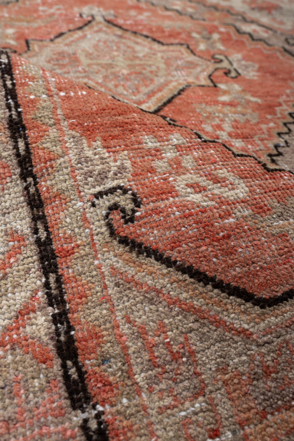 5' x 10' one-of-a-kind handmade antique Khotan large size rug. Color palette: coral, ivory, taupe, charcoal, sand
