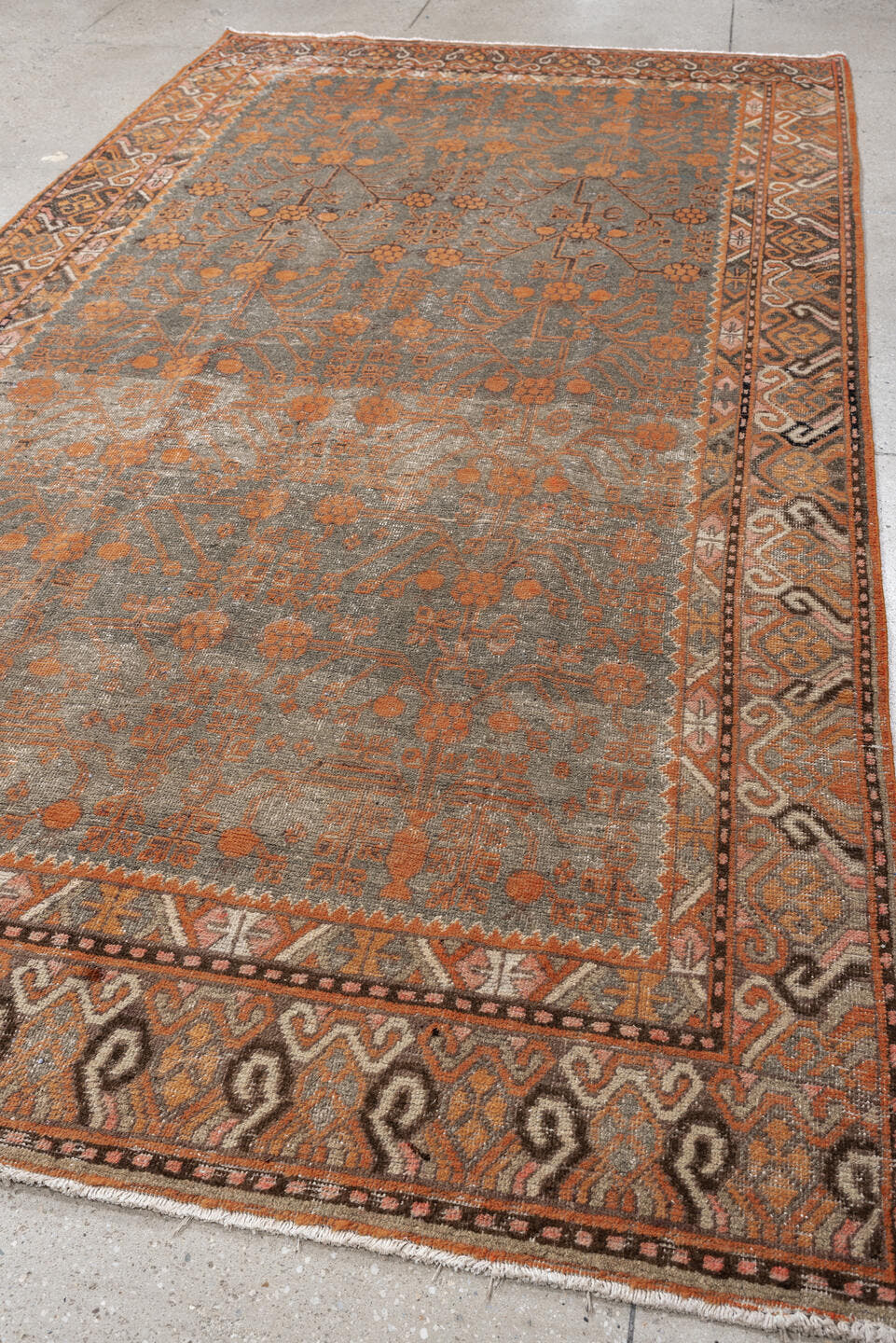 5' x 11' one-of-a-kind handmade antique Khotan large size rug. Color palette: taupe, terra cotta, charcoal, ivory, camel