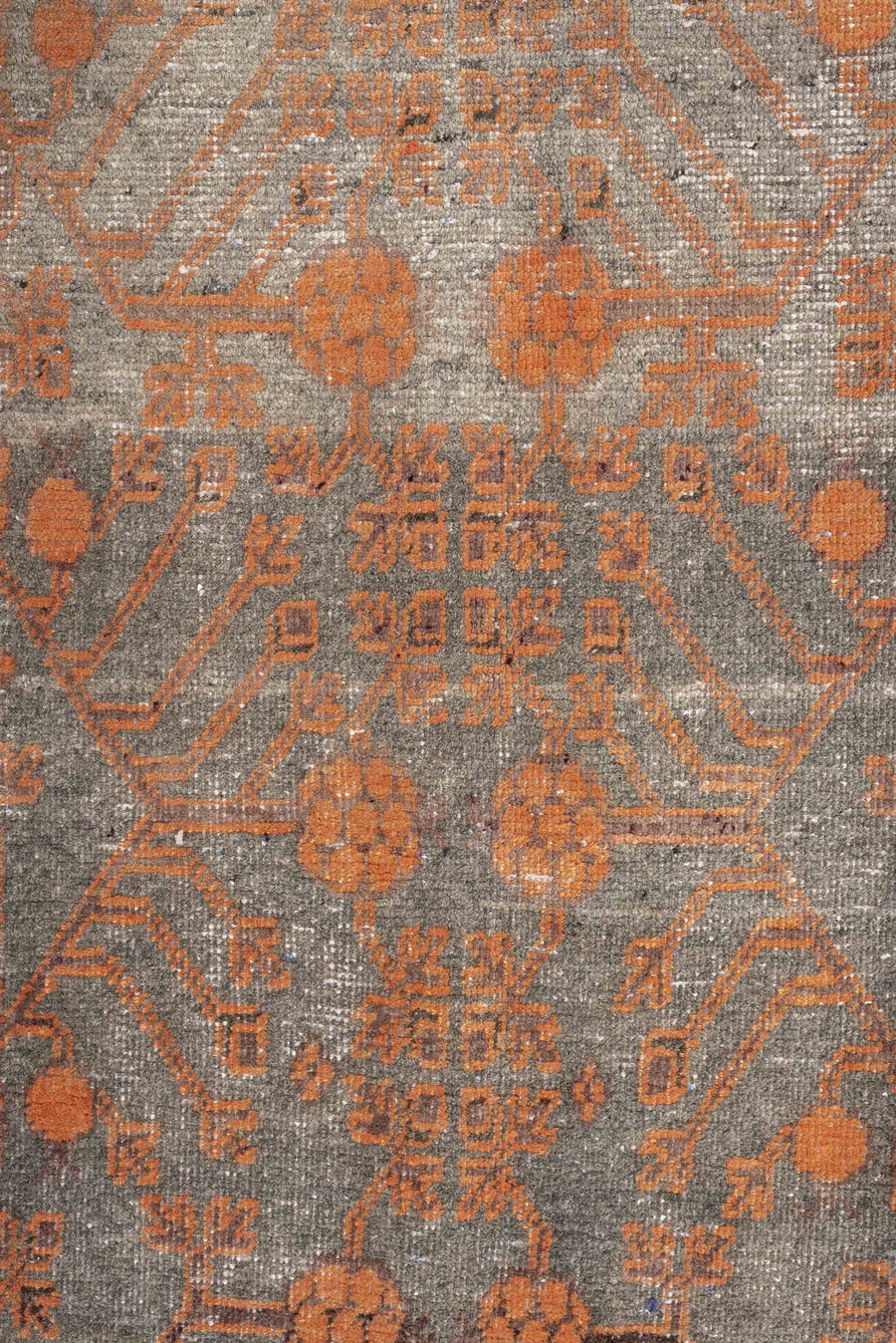 5' x 11' one-of-a-kind handmade antique Khotan large size rug. Color palette: taupe, terra cotta, charcoal, ivory, camel