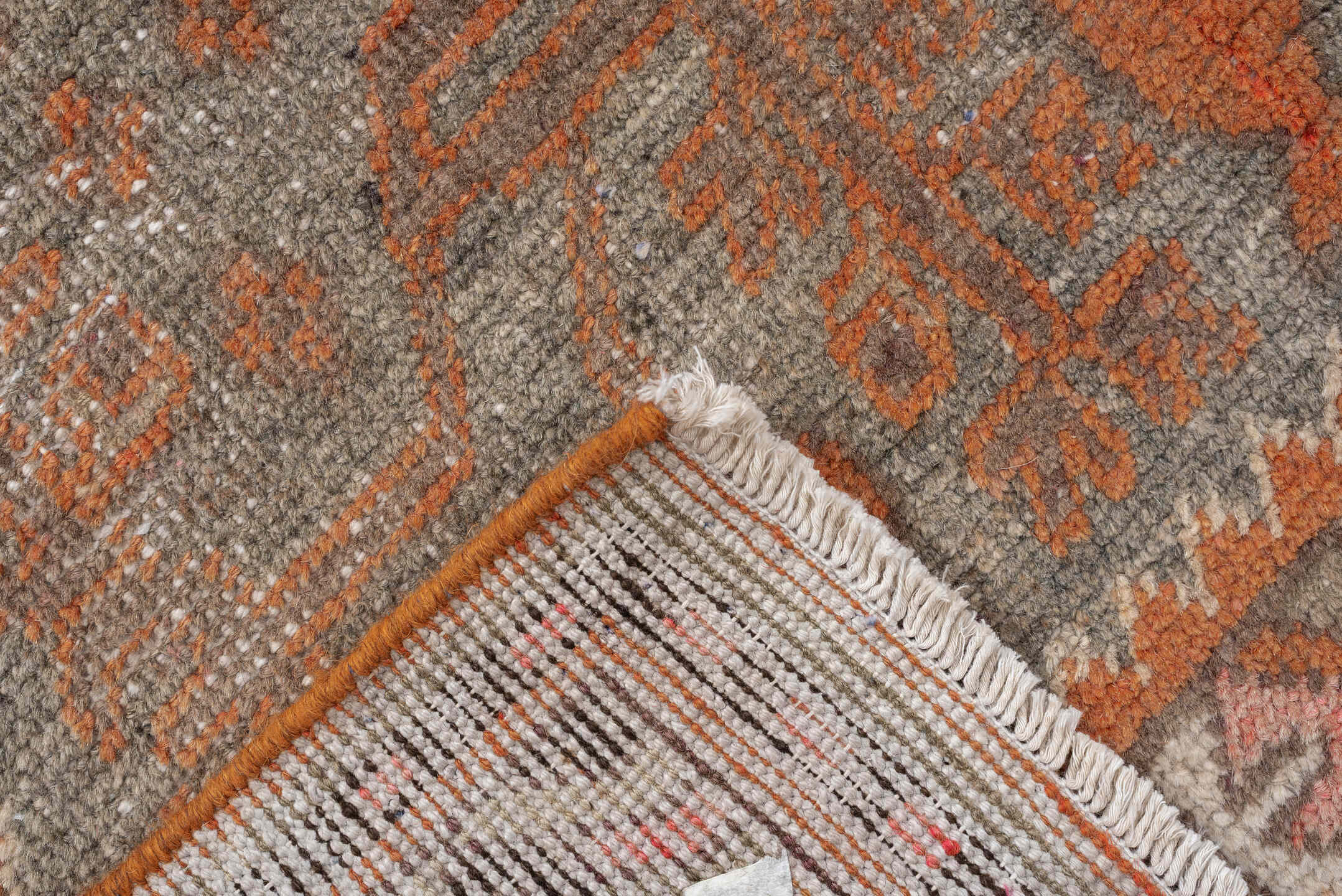 5' x 11' one-of-a-kind handmade antique Khotan large size rug. Color palette: taupe, terra cotta, charcoal, ivory, camel
